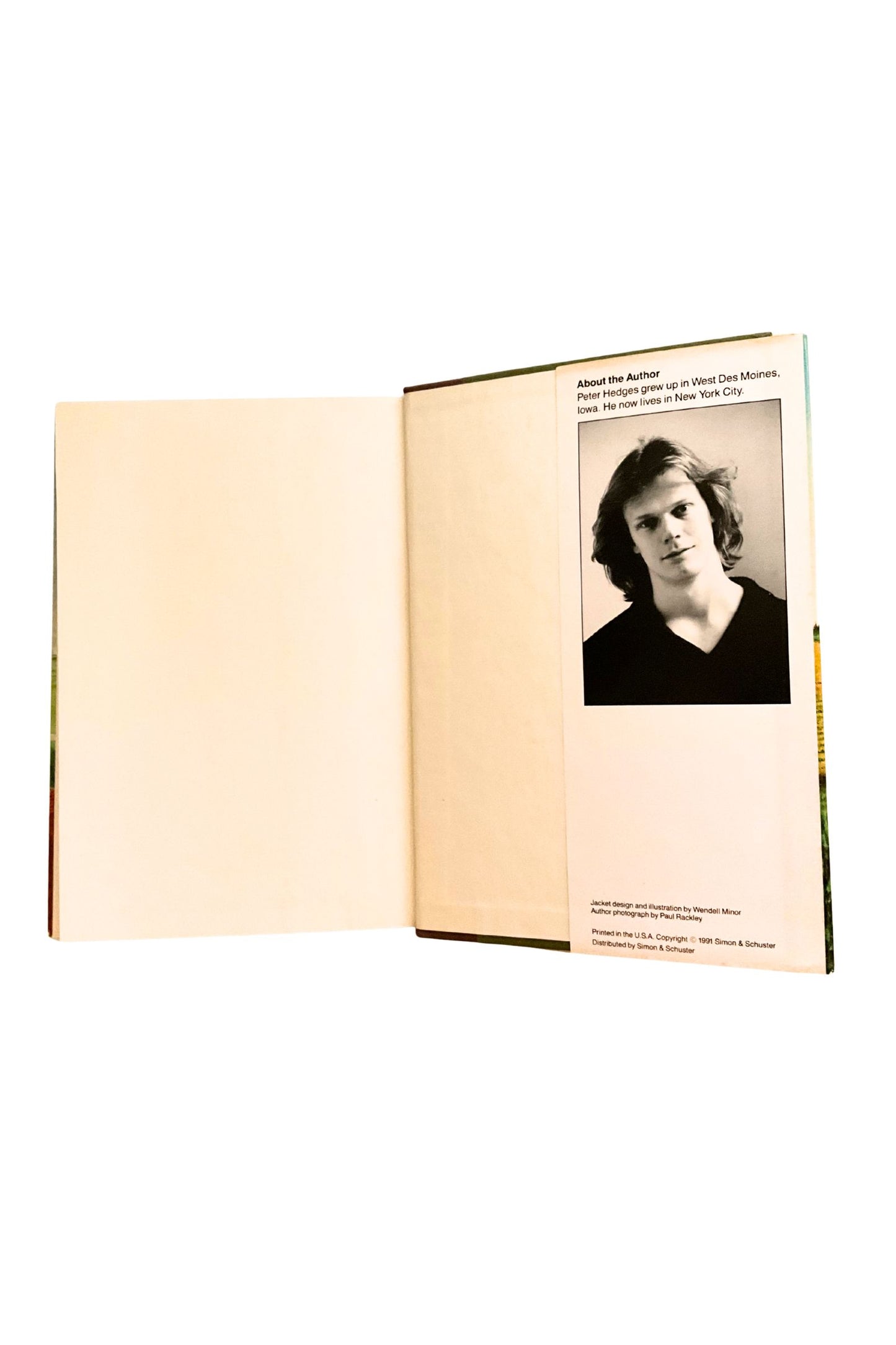 Open book with a photo of the author on the right page