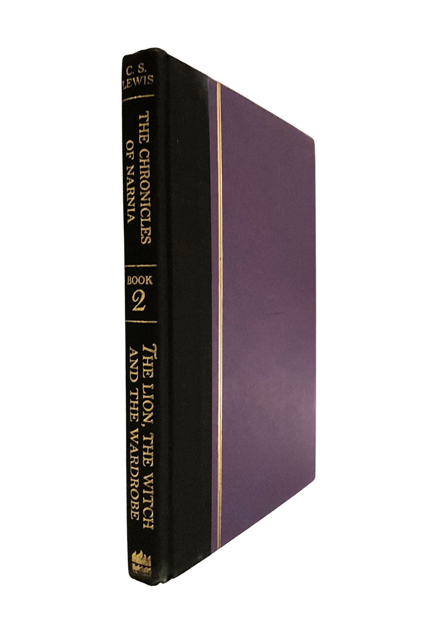 Purple book titled 'The Chronicles of Narnia: The Lion, the Witch and the Wardrobe' with gold text on a white background