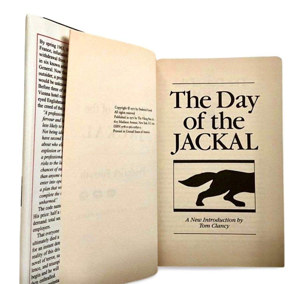 Open book titled 'The Day of the Jackal' with a black and white cover design.