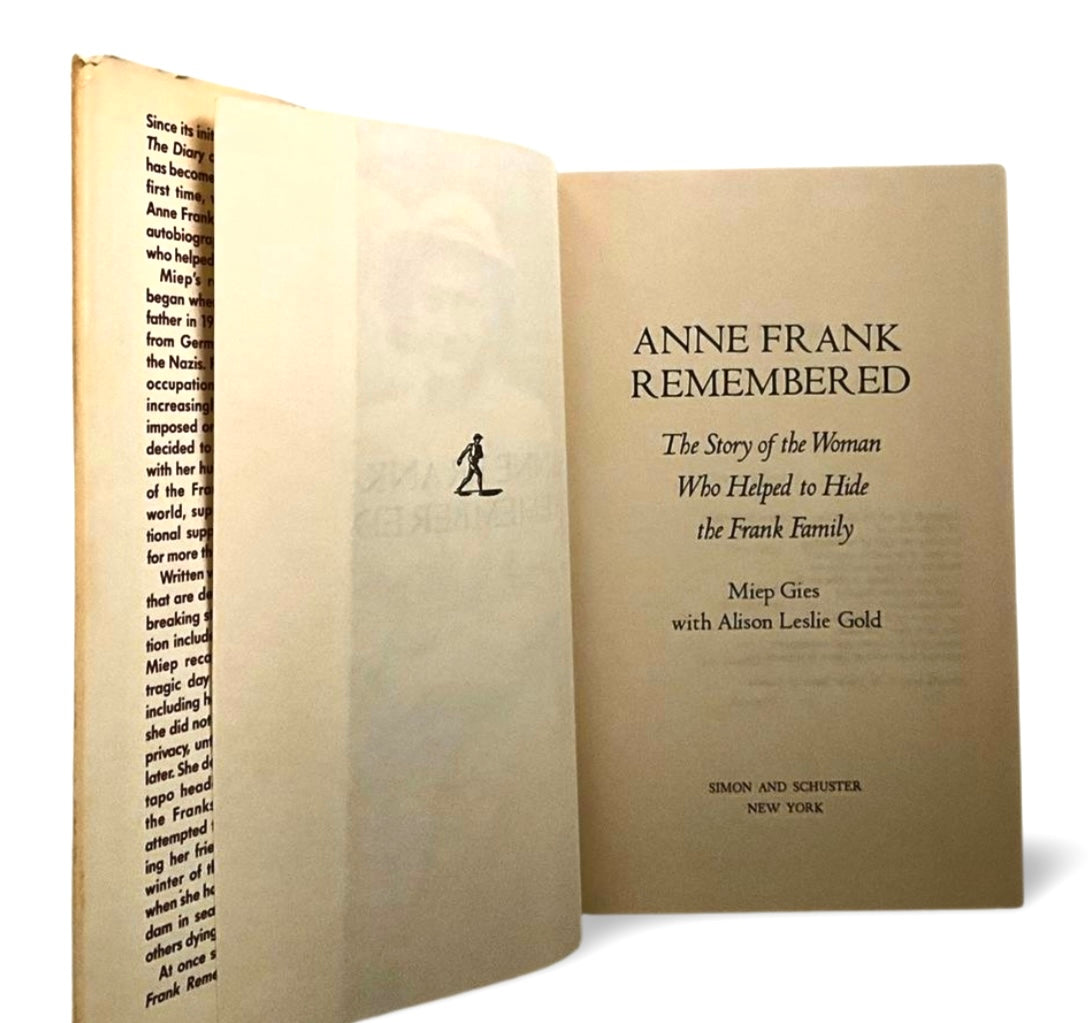 Open book showing the title page'on a white background