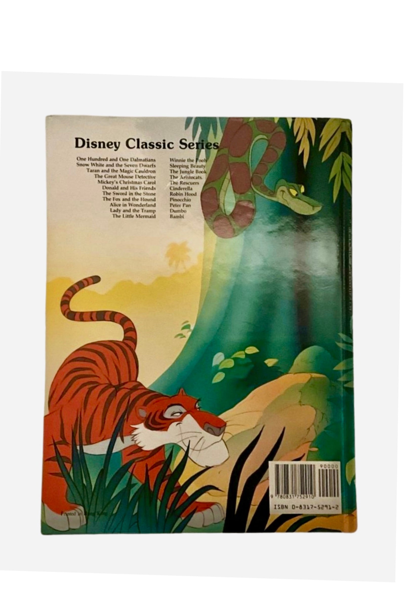 Back cover of The Jungle Book featuring a tiger in a jungle scene.