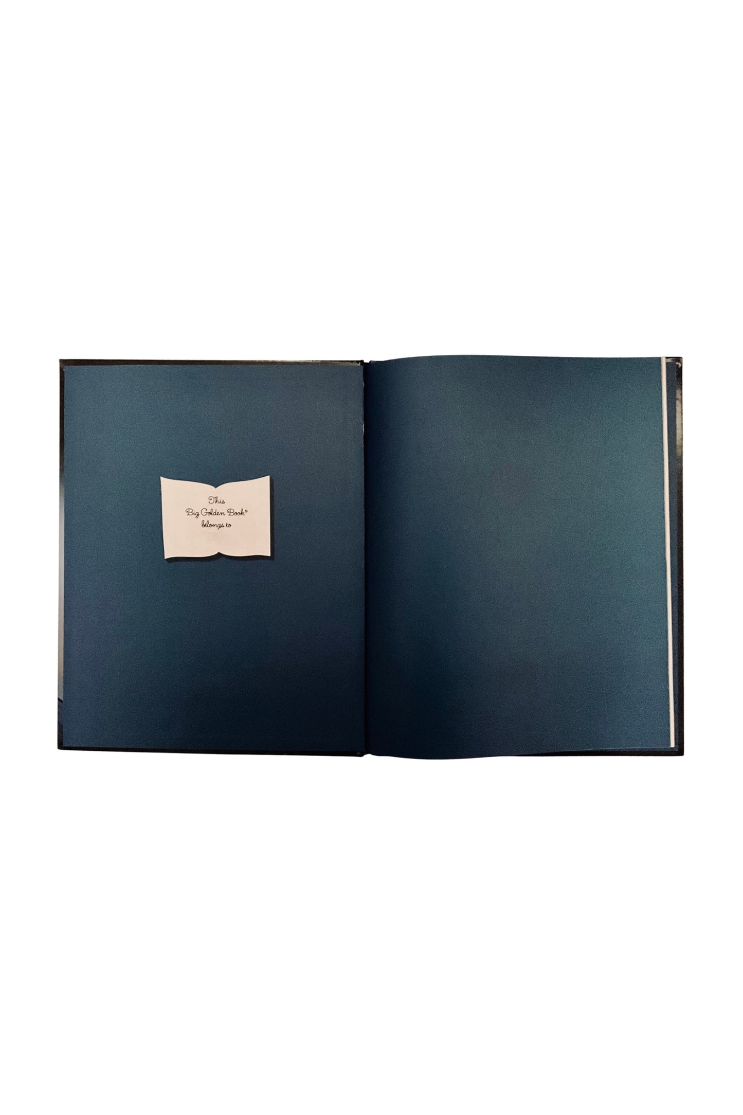 Open book with a white bookplate on dark blue pages