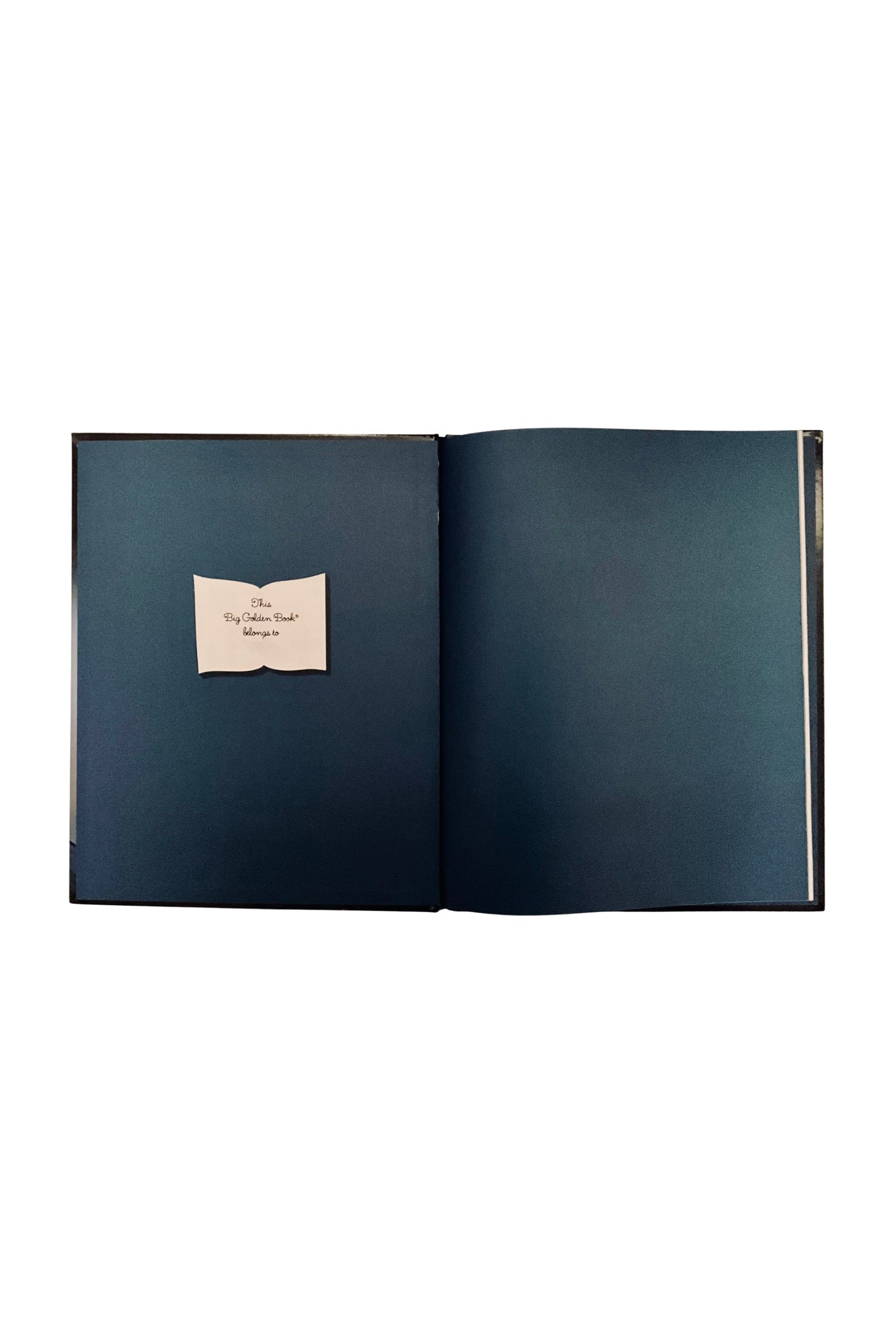Open book with a white bookplate on dark blue pages