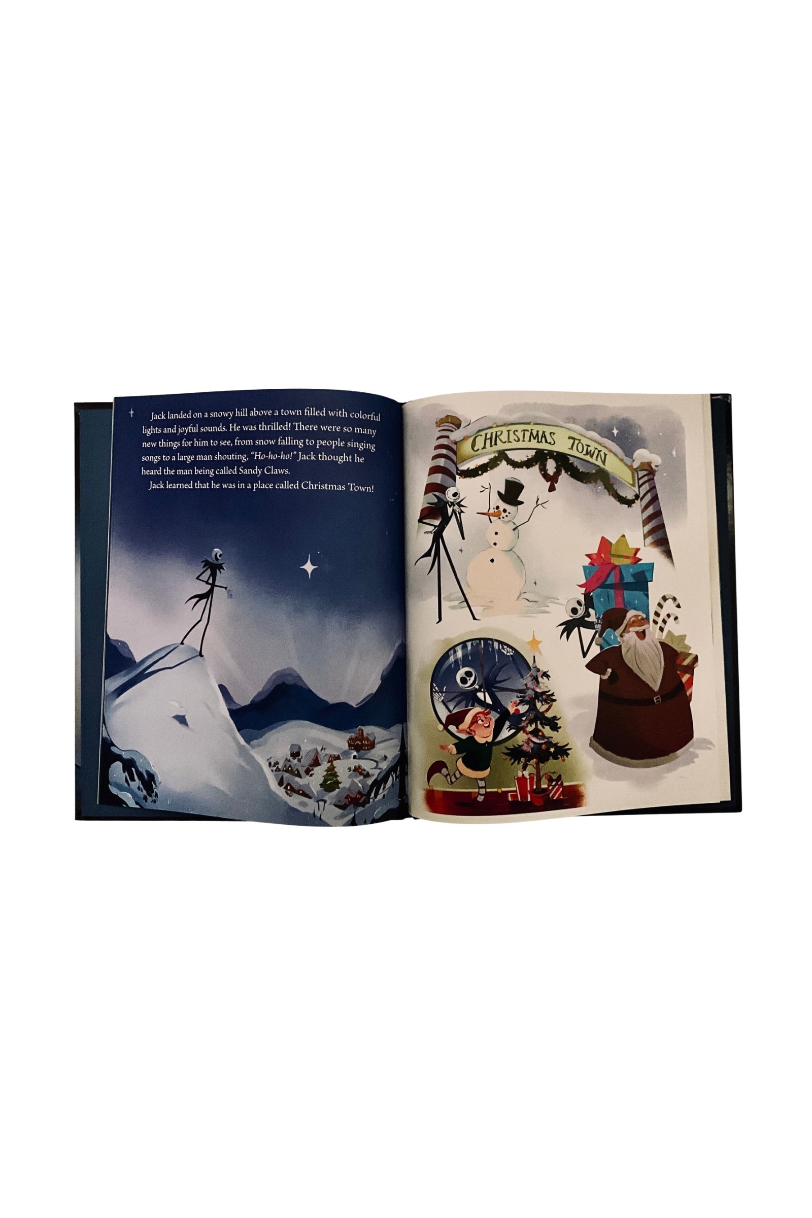 Open book with Christmas-themed illustrations on a white background