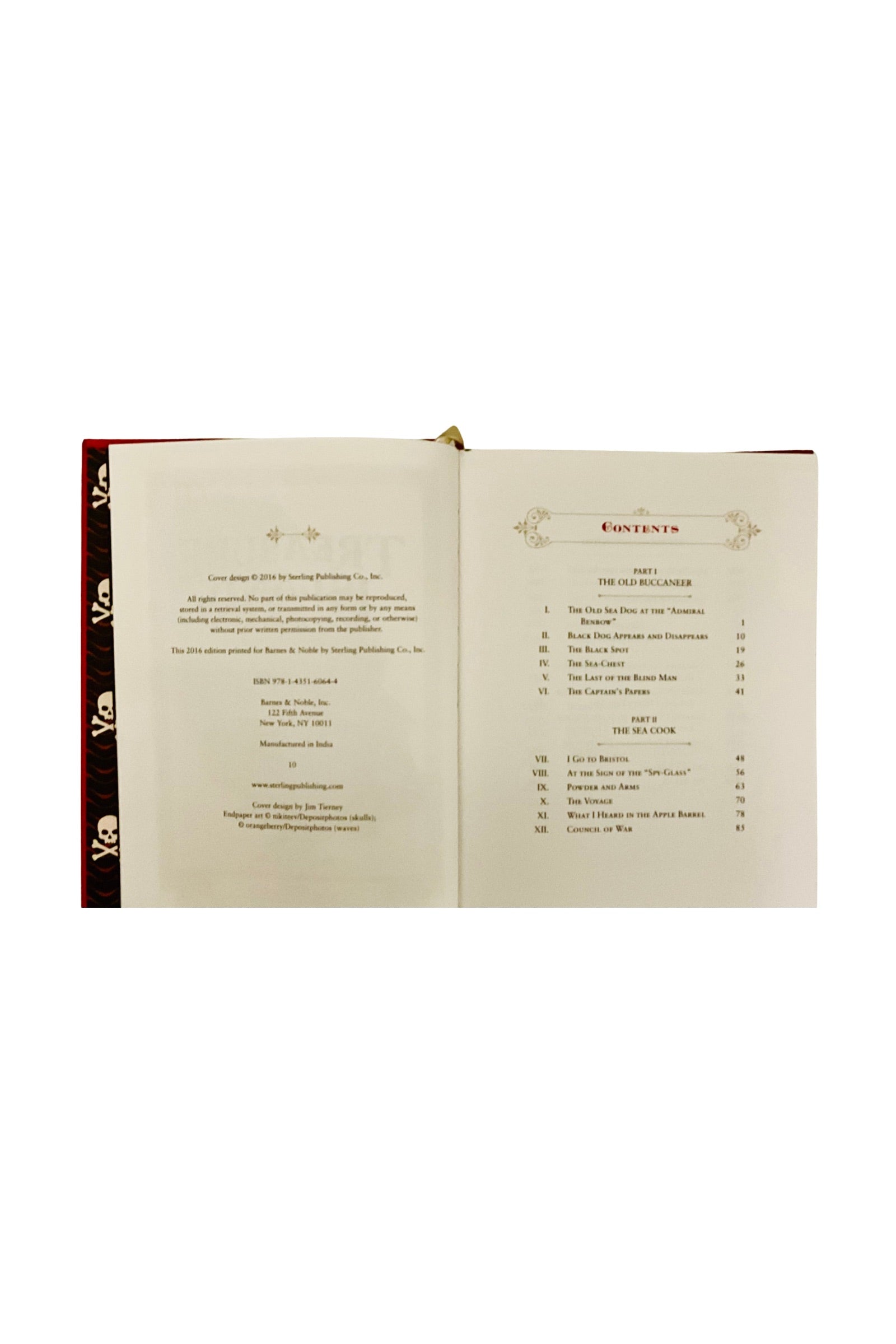 Open book with table of contents and copyright pages on a white background