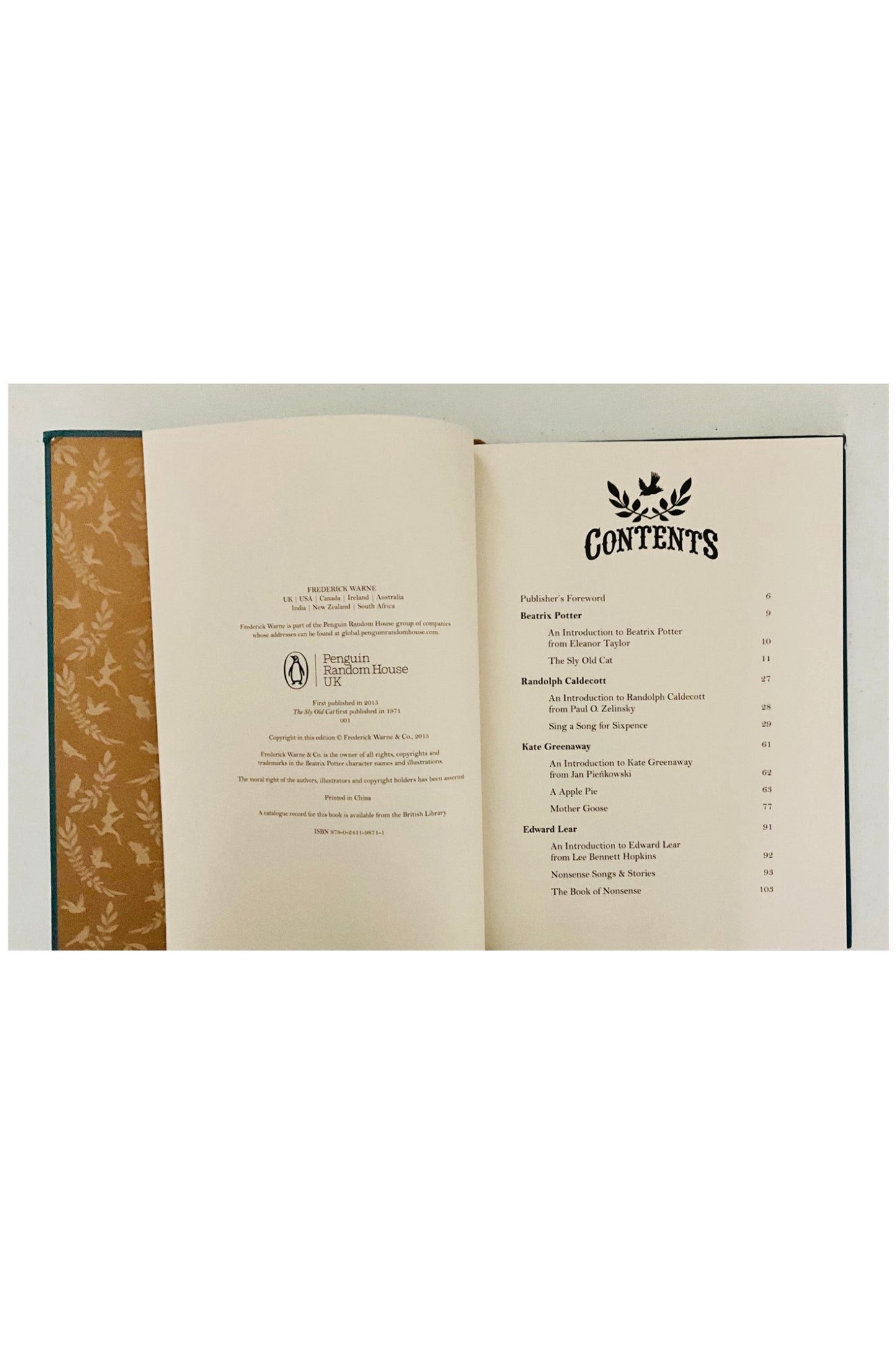 Open book with a 'Contents' page and decorative touches on a white background