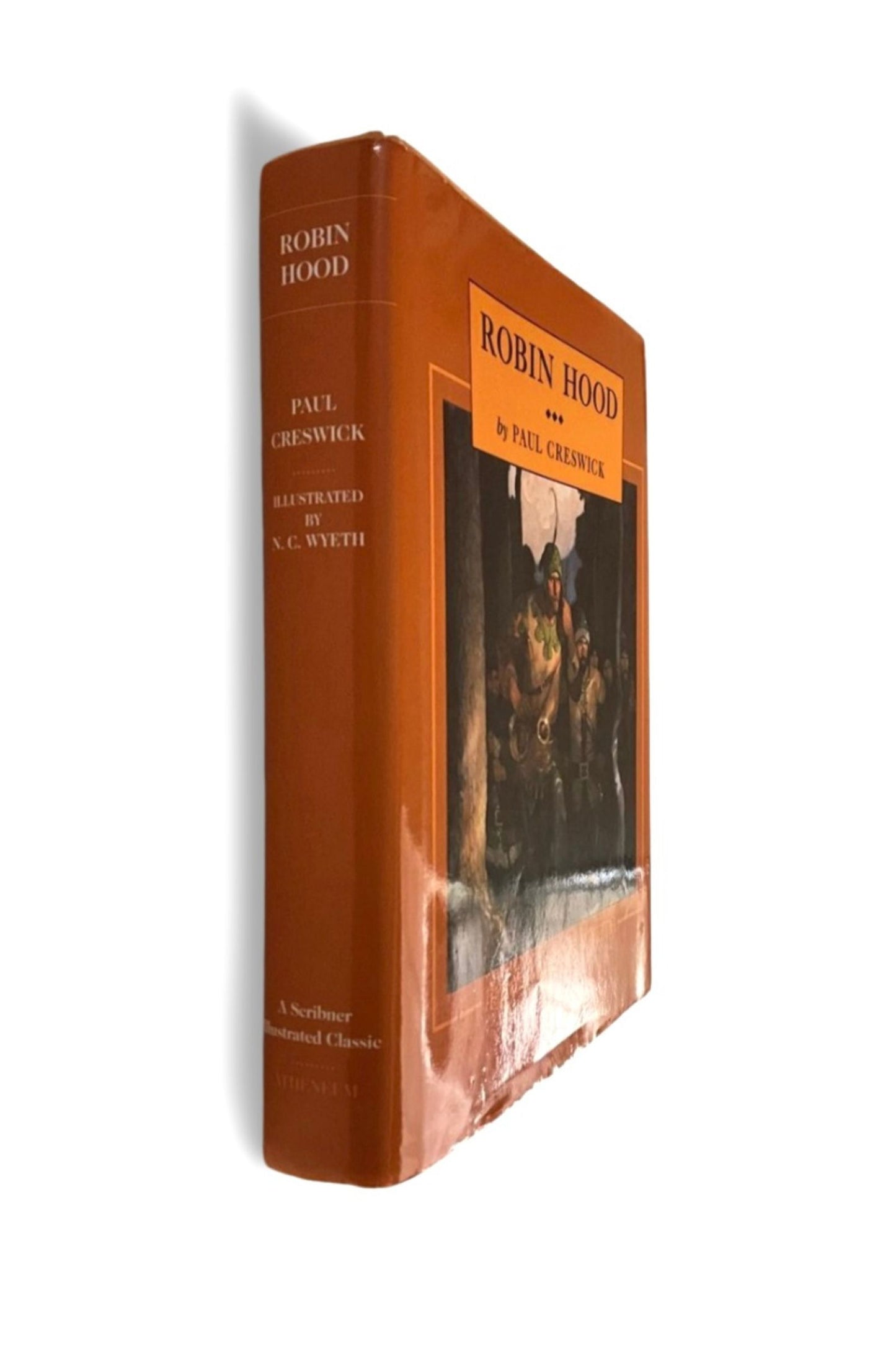 Book titled 'Robin Hood' with orange cover on a white background, the angle shows the book’s spine