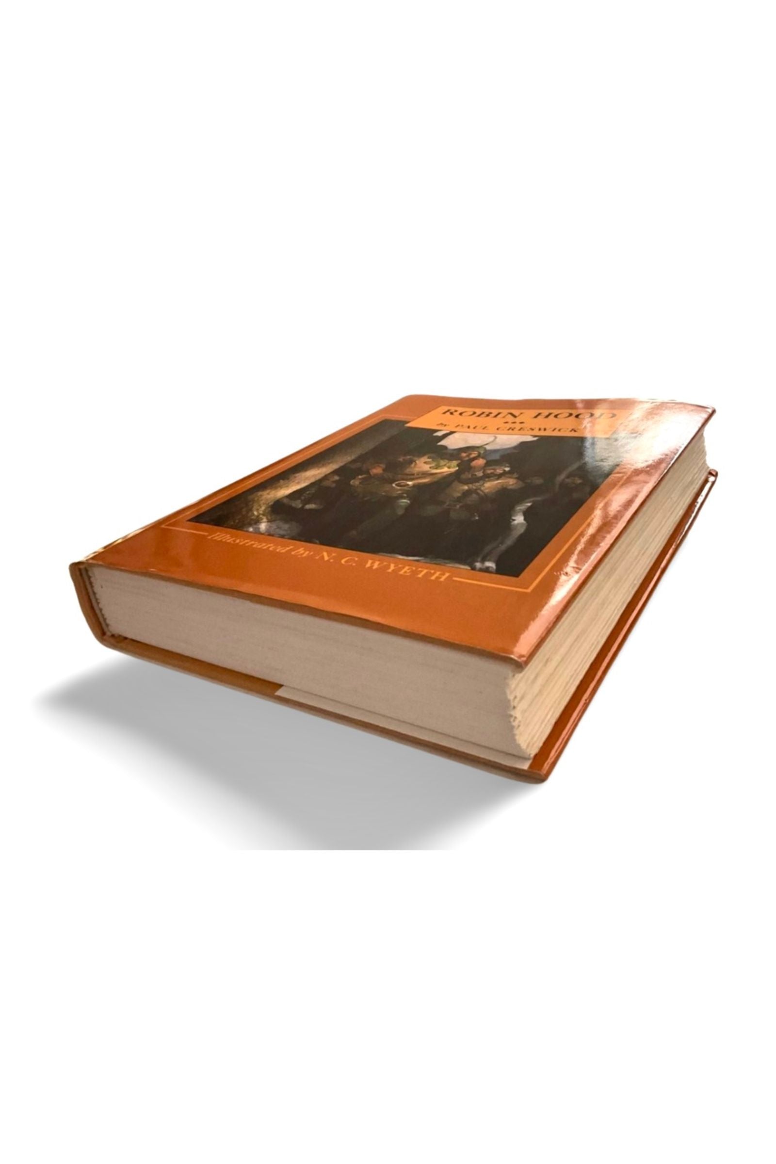 Book with orange cover on a white background