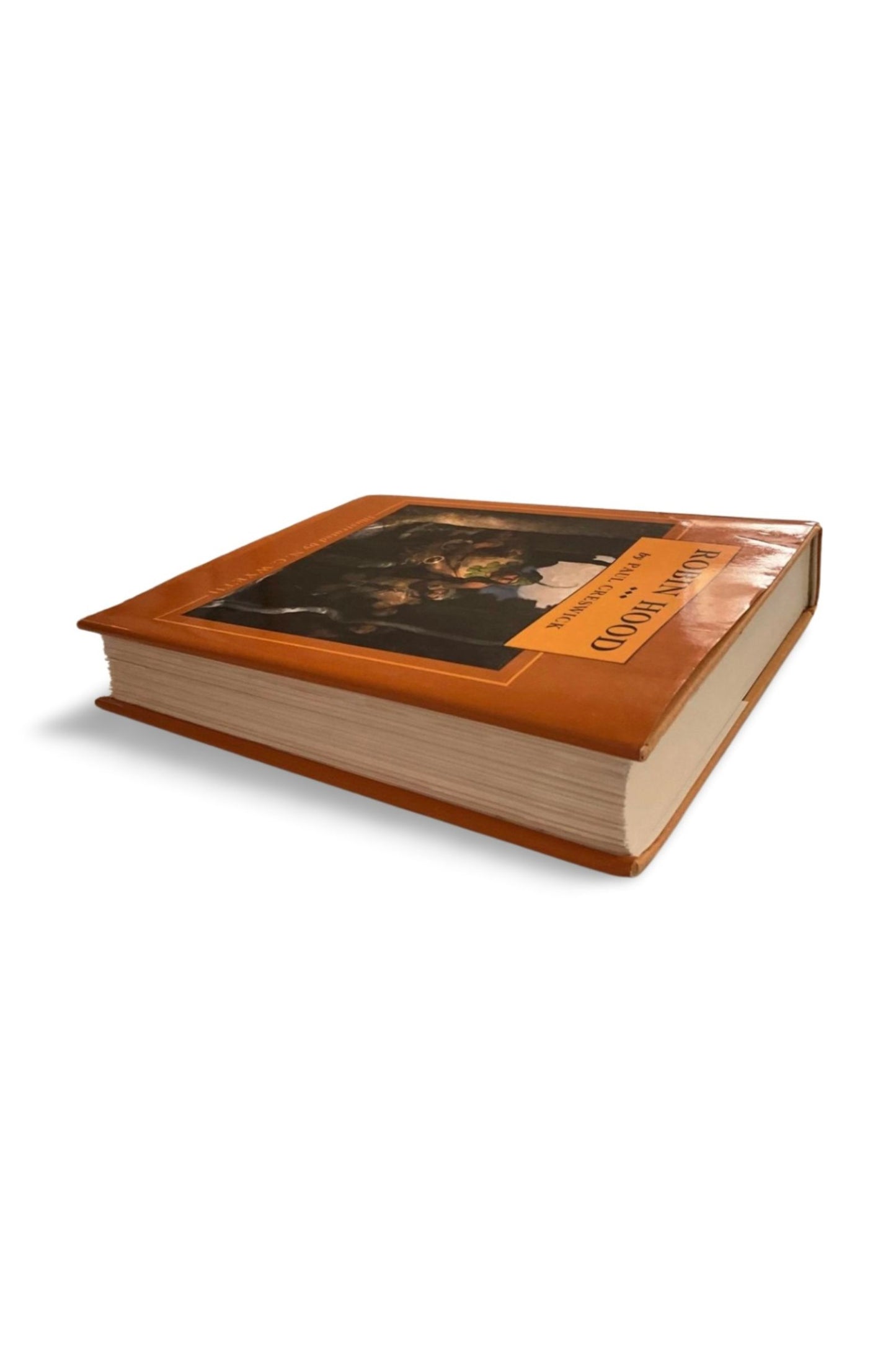 Book with a glossy orange cover on a white background