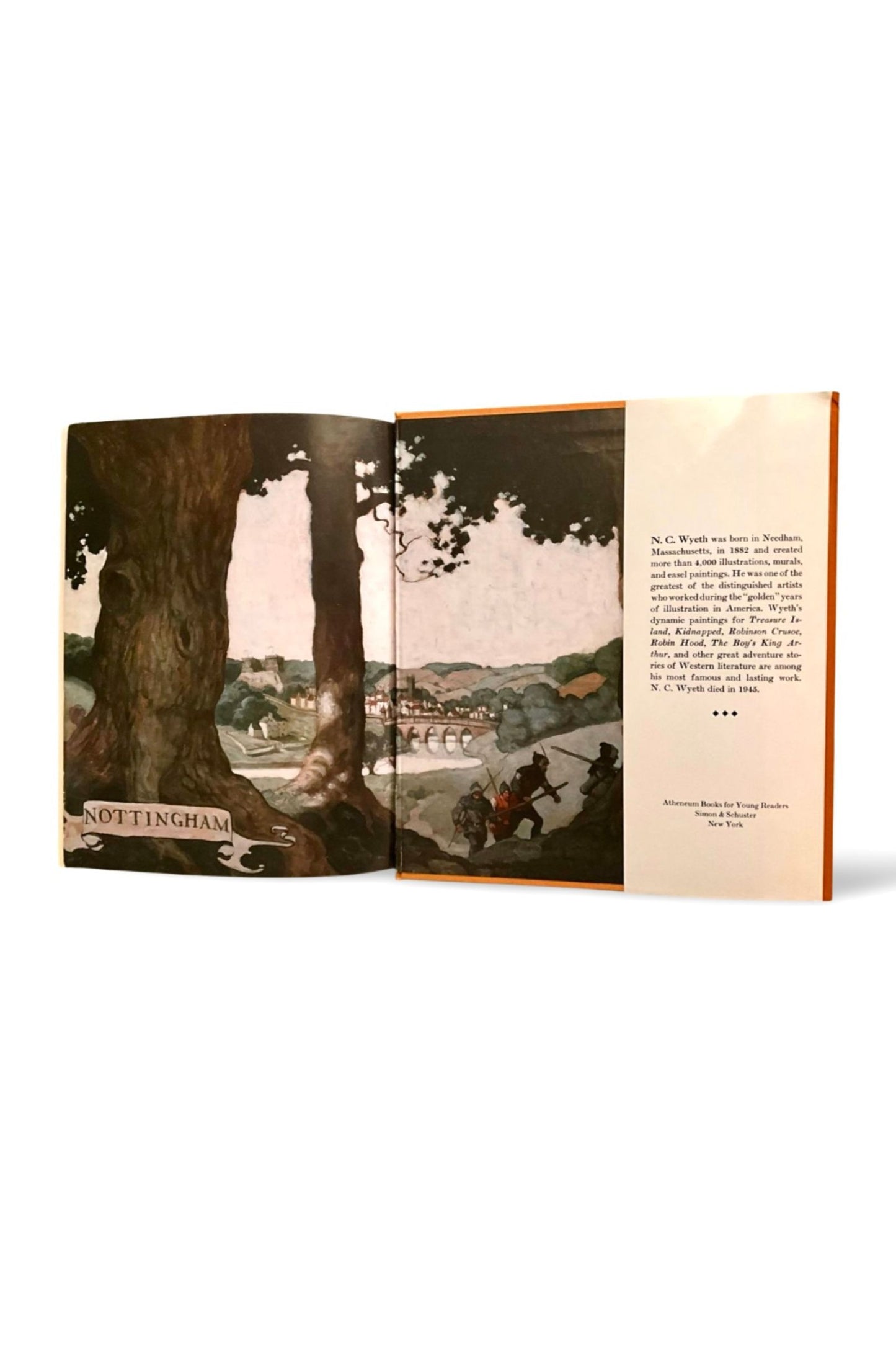 Open book with illustrations of a landscape and people, on a white background