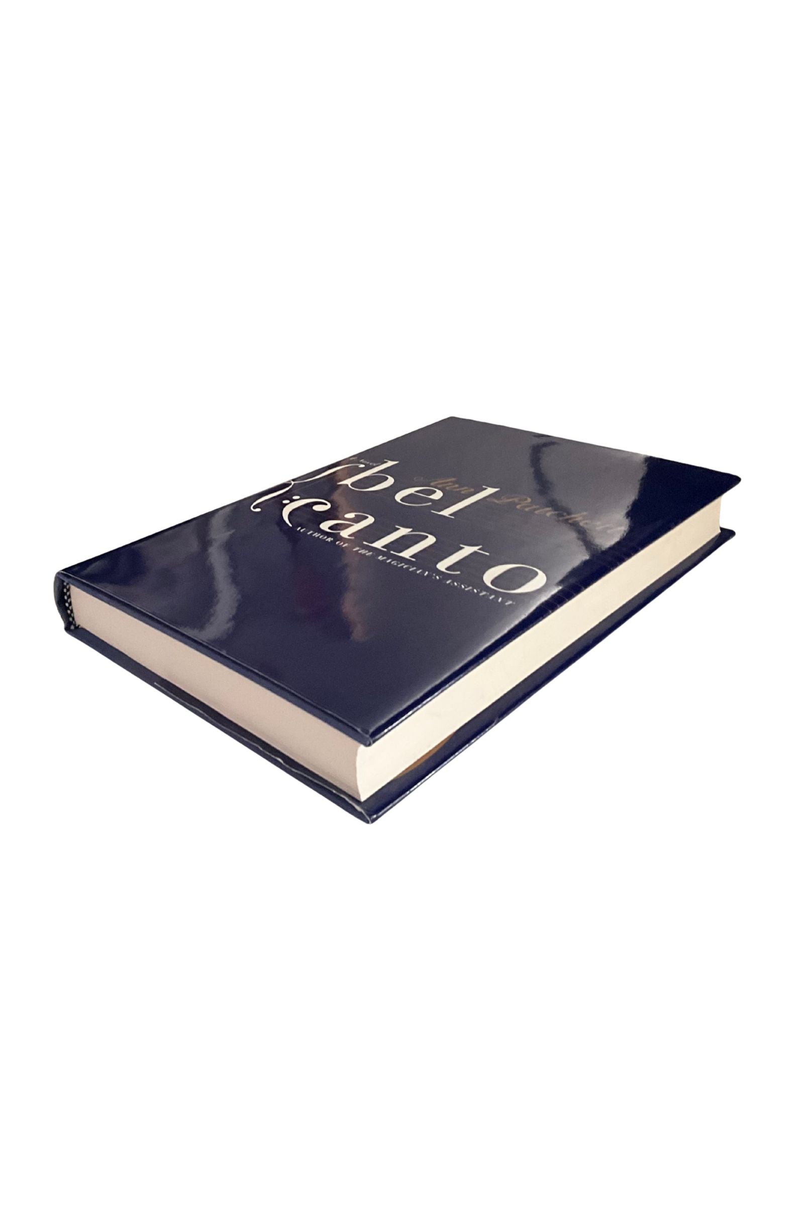 Blue book titled 'bel canto' on a white background