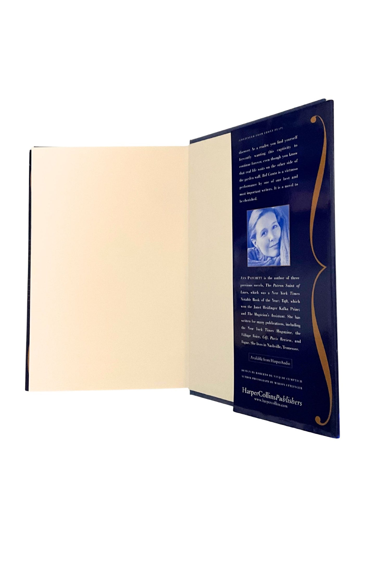 Book opened to the inside of the back cover showing text and a photo image of the author