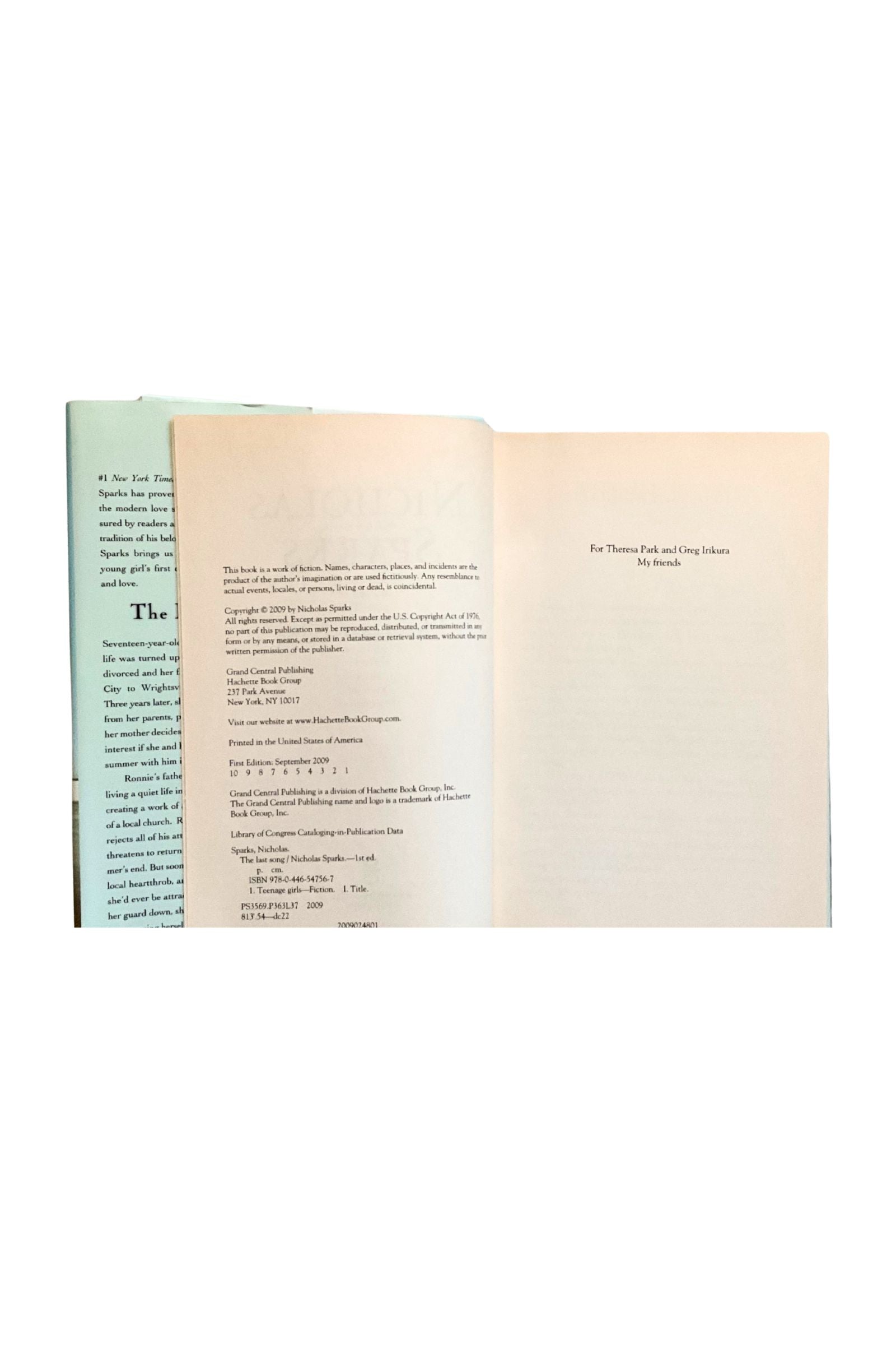Open book showing the copyright page  on a white background