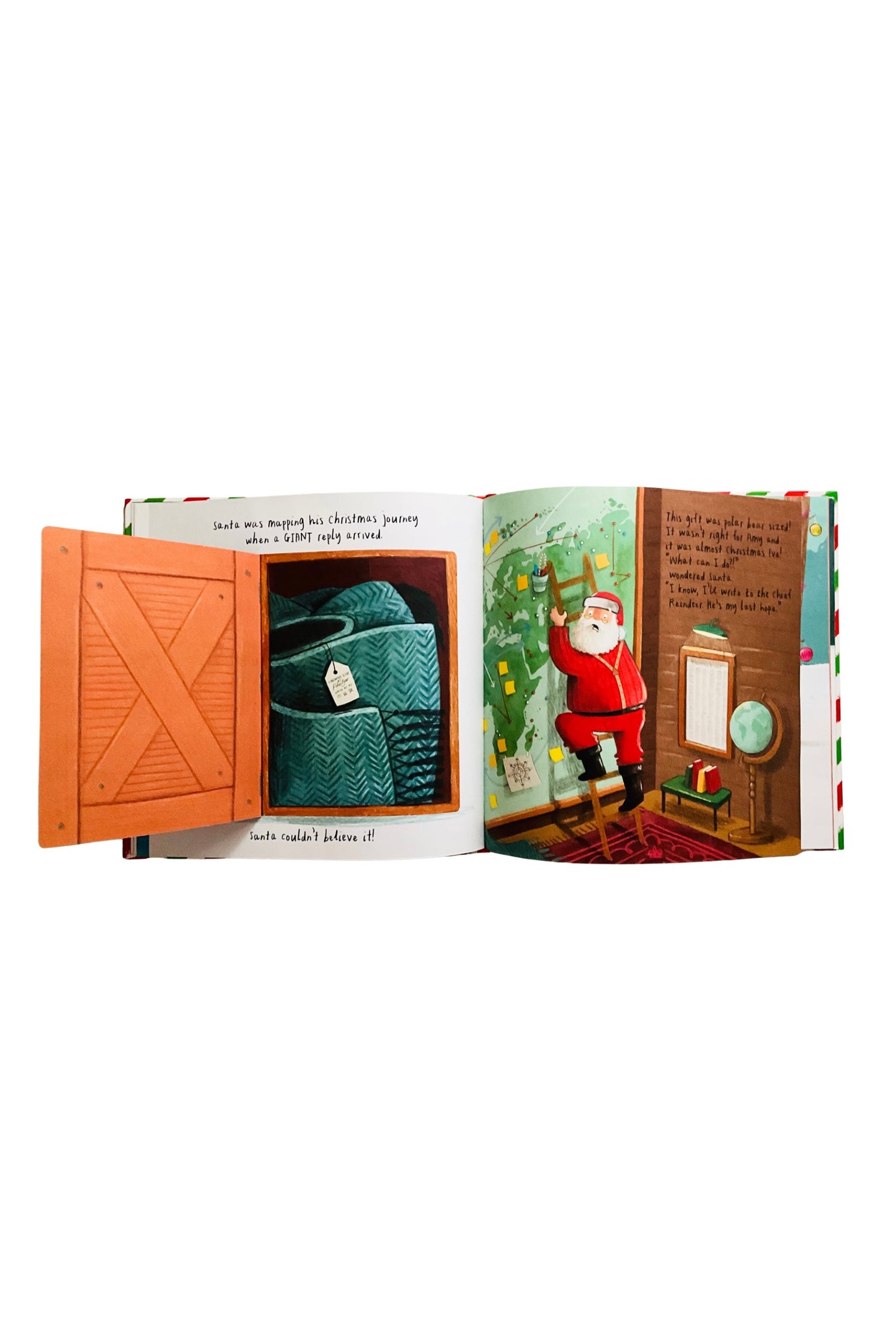 Open book with a Christmas-themed illustration of Santa Claus and a window pop-up 