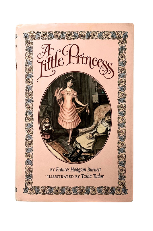 Book cover of 'A Little Princess' with decorative border and illustration of a girl in a pink dress.