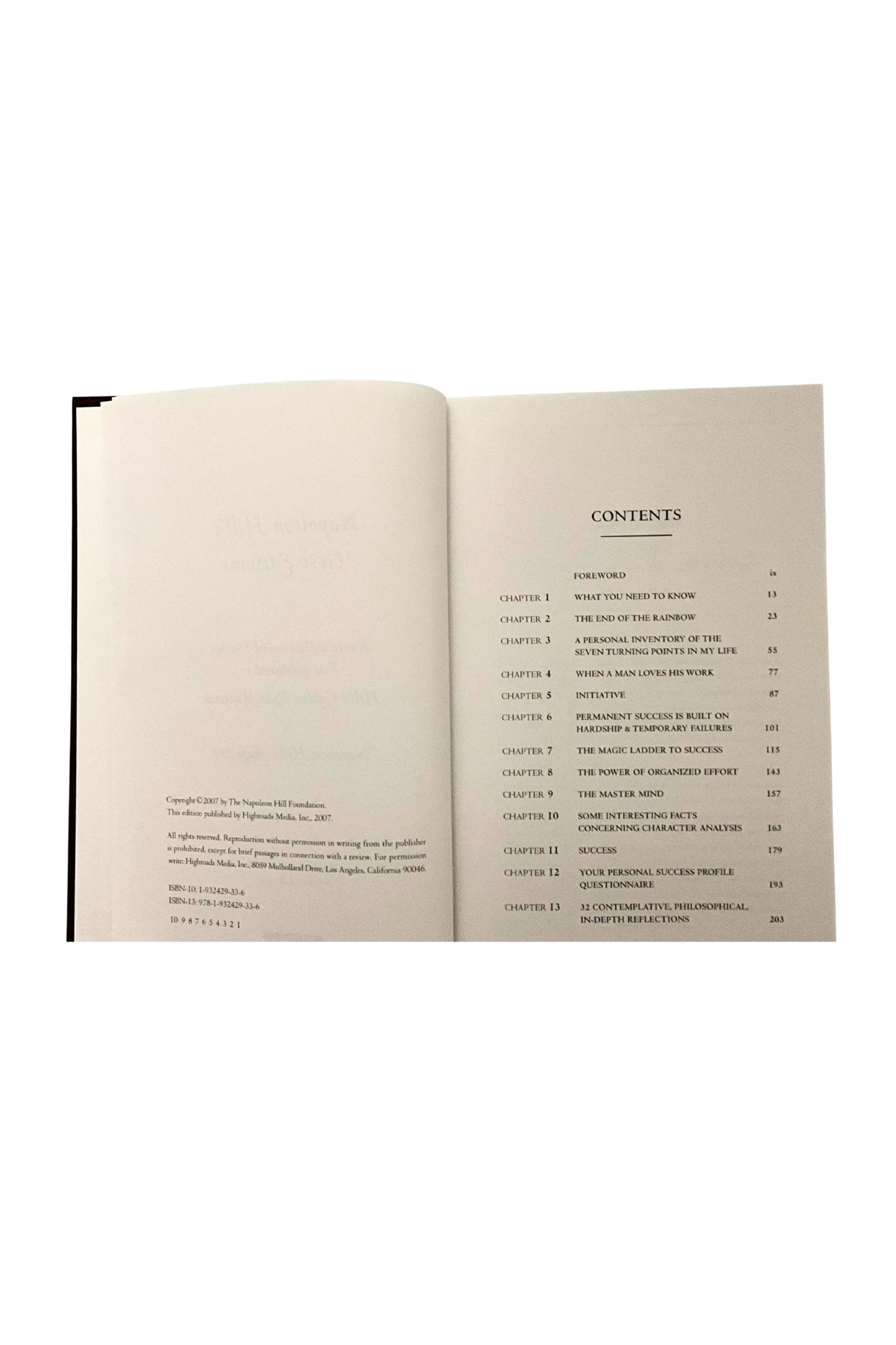 Open book showing a table of contents on a white background 