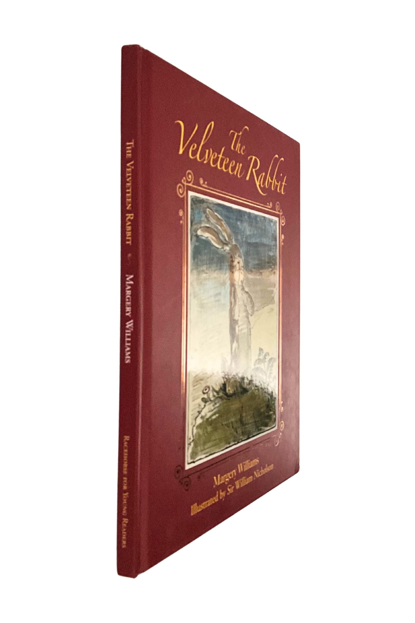 Red book cover with illustration of a rabbit and text 'The Velveteen Rabbit' on a white background