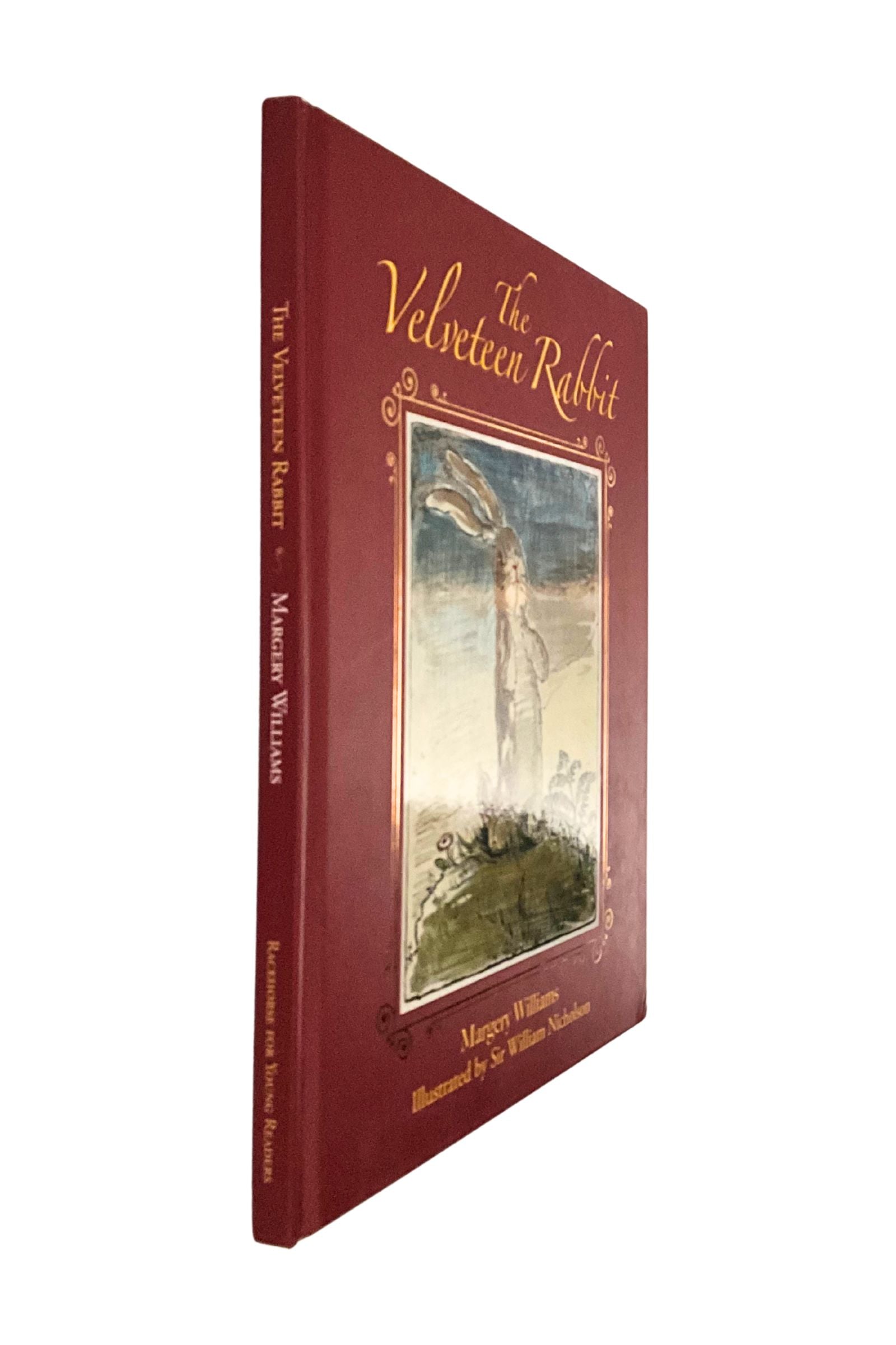 Red book cover with illustration of a rabbit and text 'The Velveteen Rabbit' on a white background