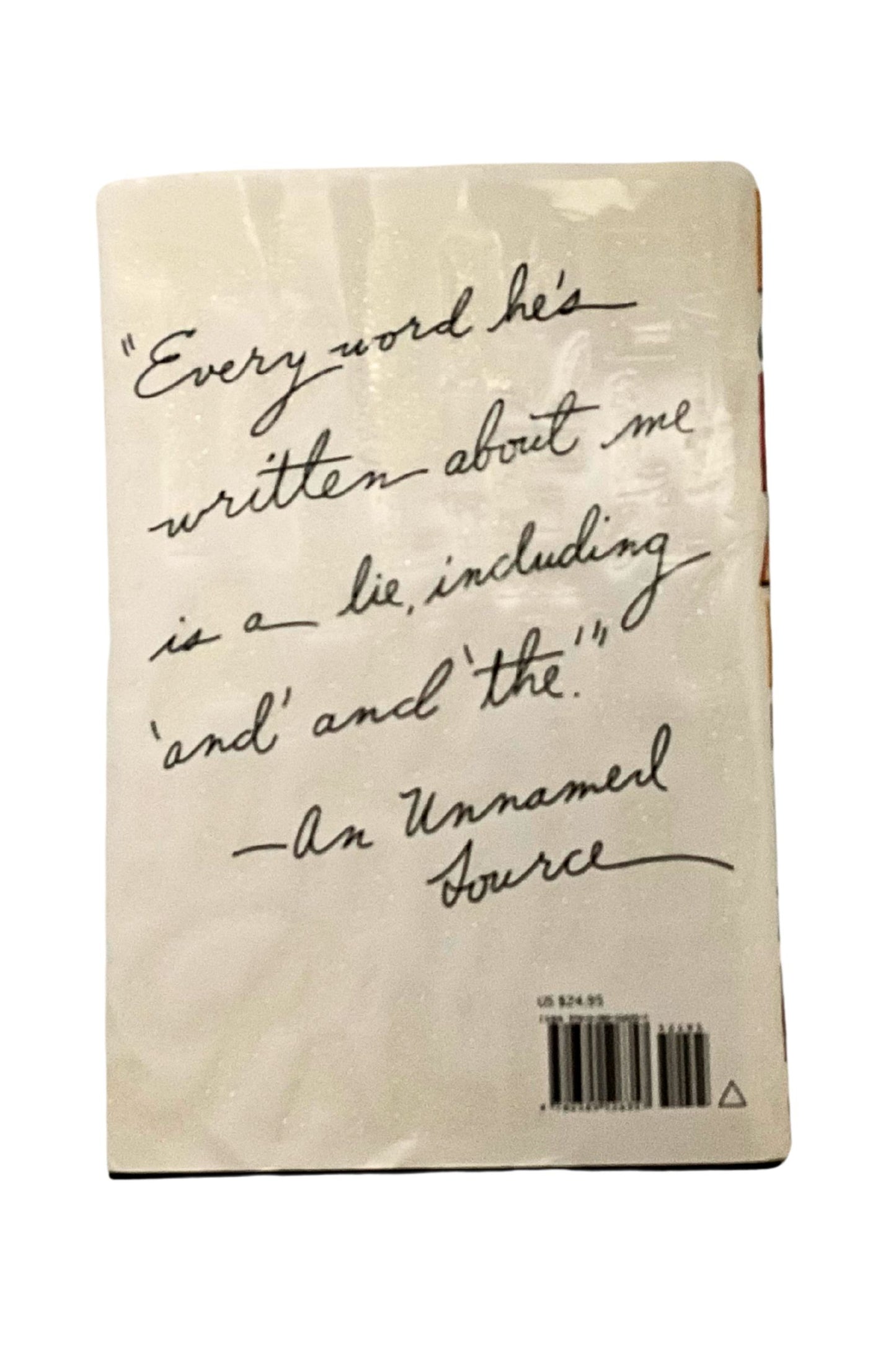 Book cover with handwritten text and a barcode on a white background