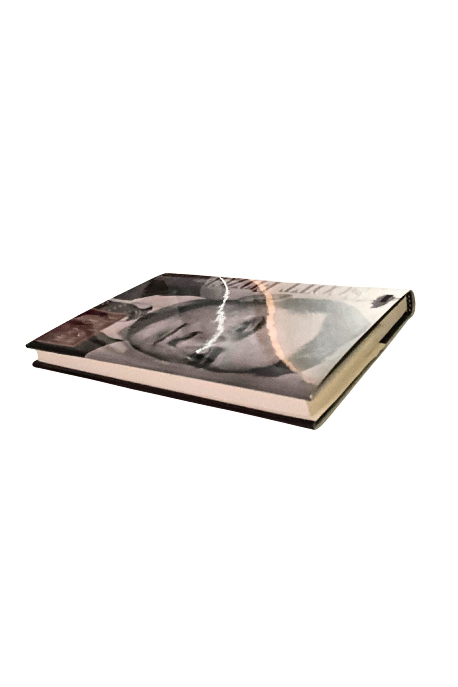 Book with a black and white cover on a white background