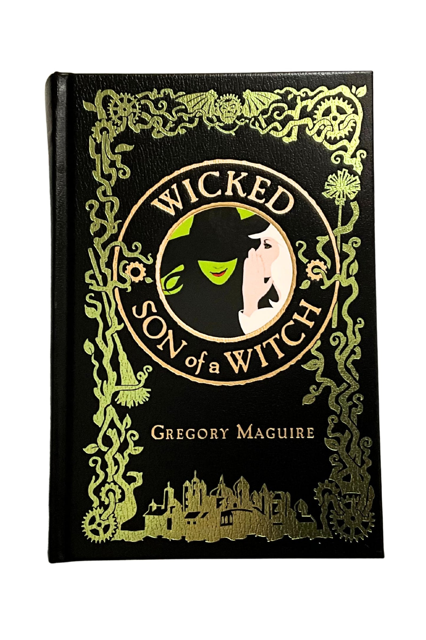 Book cover of 'Wicked and Son of a Witch' by Gregory Maguire with decorative gold design on black background