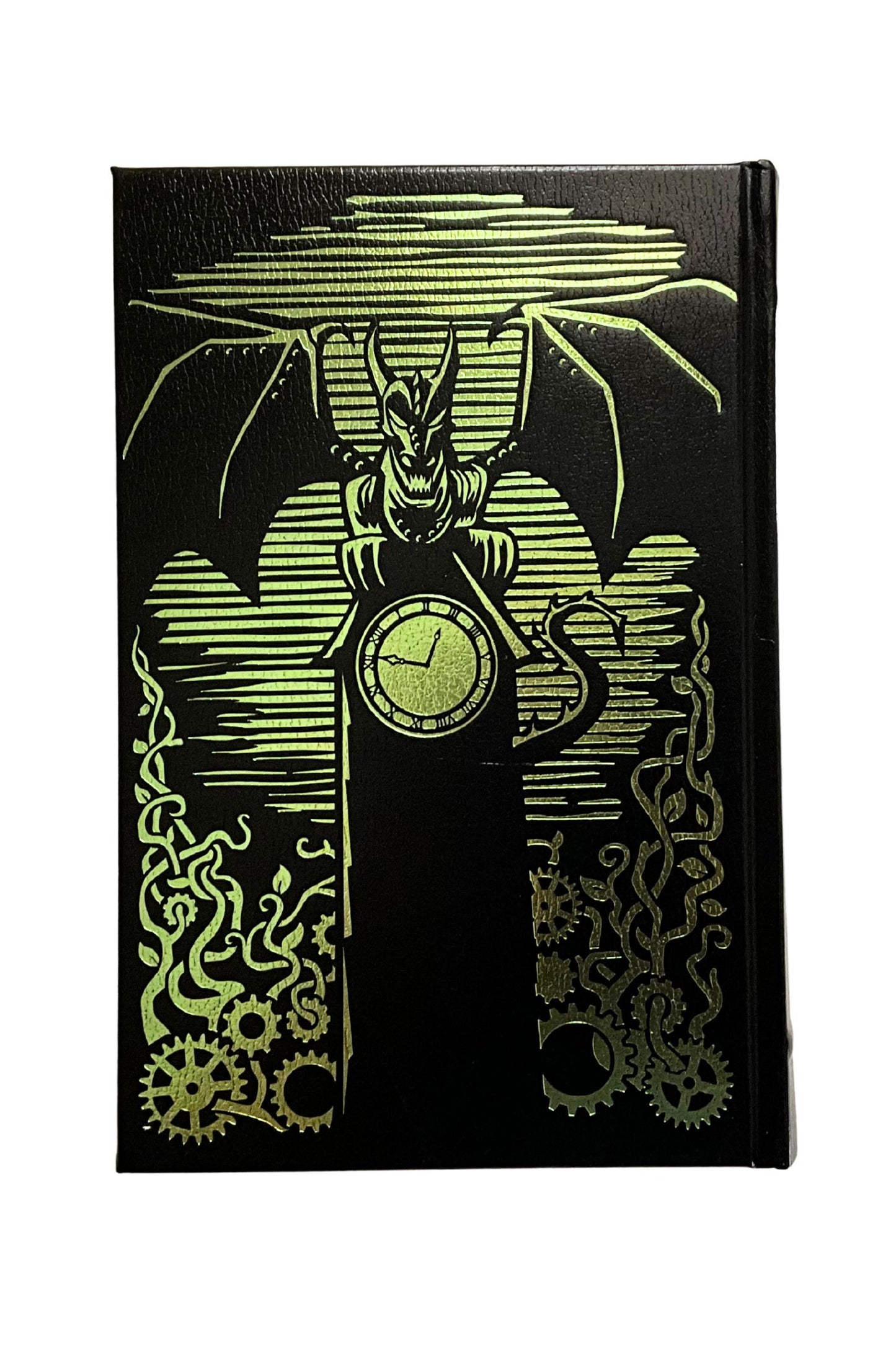 Decorative back cover of Wicked and Son of a Witch with a dragon and clock design on a black background