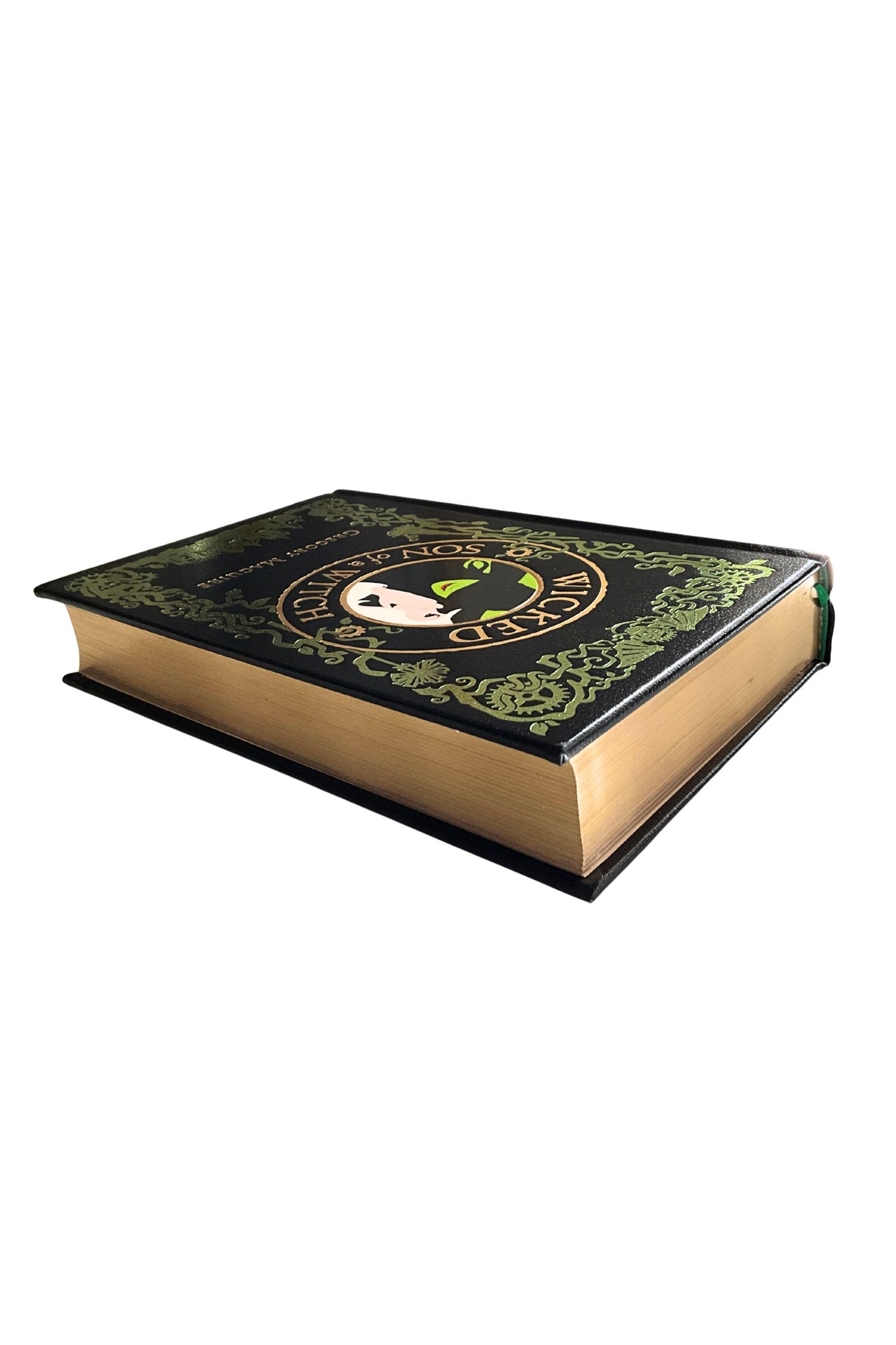 book with green decorative elements on a black leather cover on a white background
