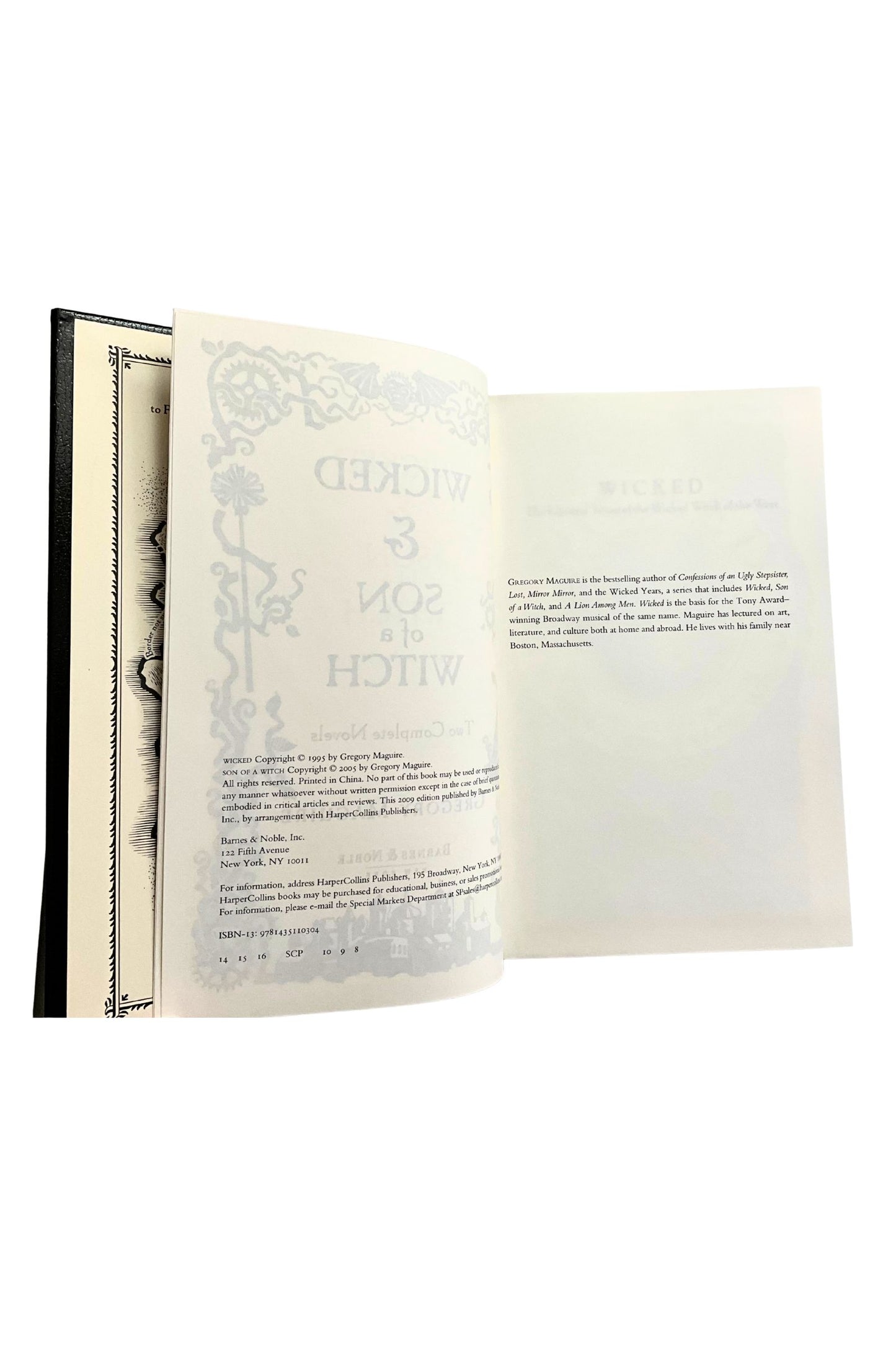 Open book with decorative text on a white background