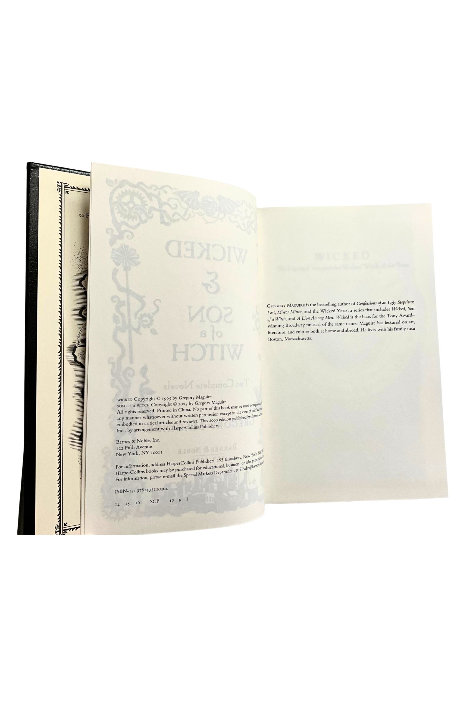 Open book with decorative text on a white background