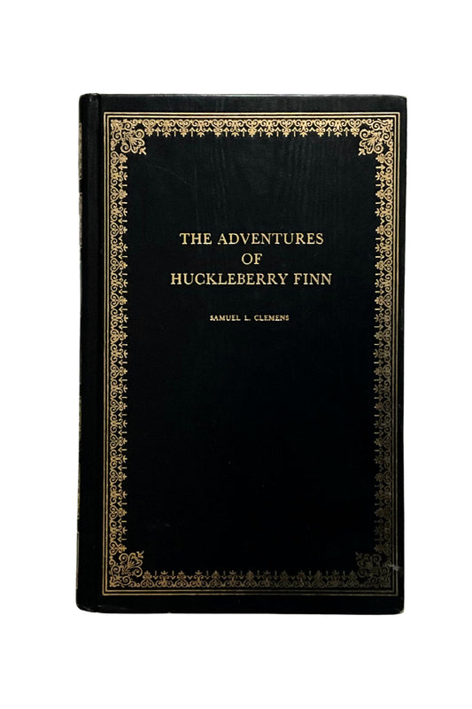 Black book cover of 'The Adventures of Huckleberry Finn' with gold decorative elements on a white background