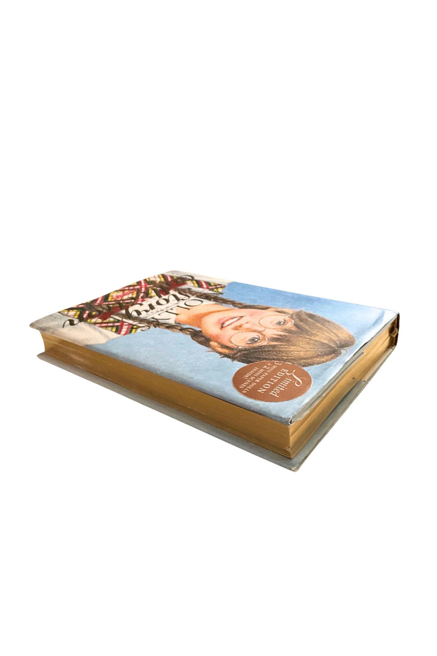 Book with a cover featuring a young girl on a white background