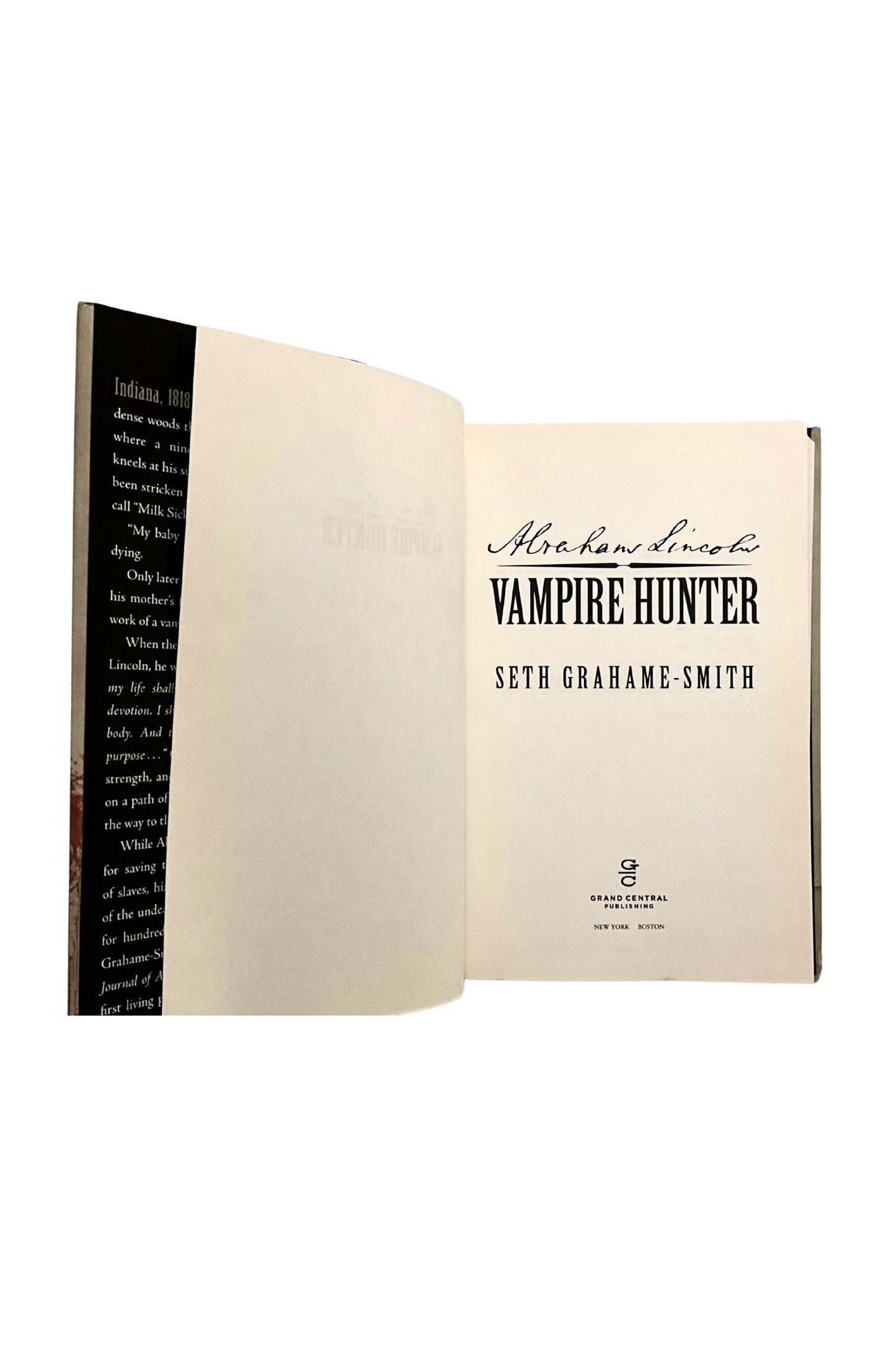 Open book with 'Vampire Hunter' written on the title page on a white background
