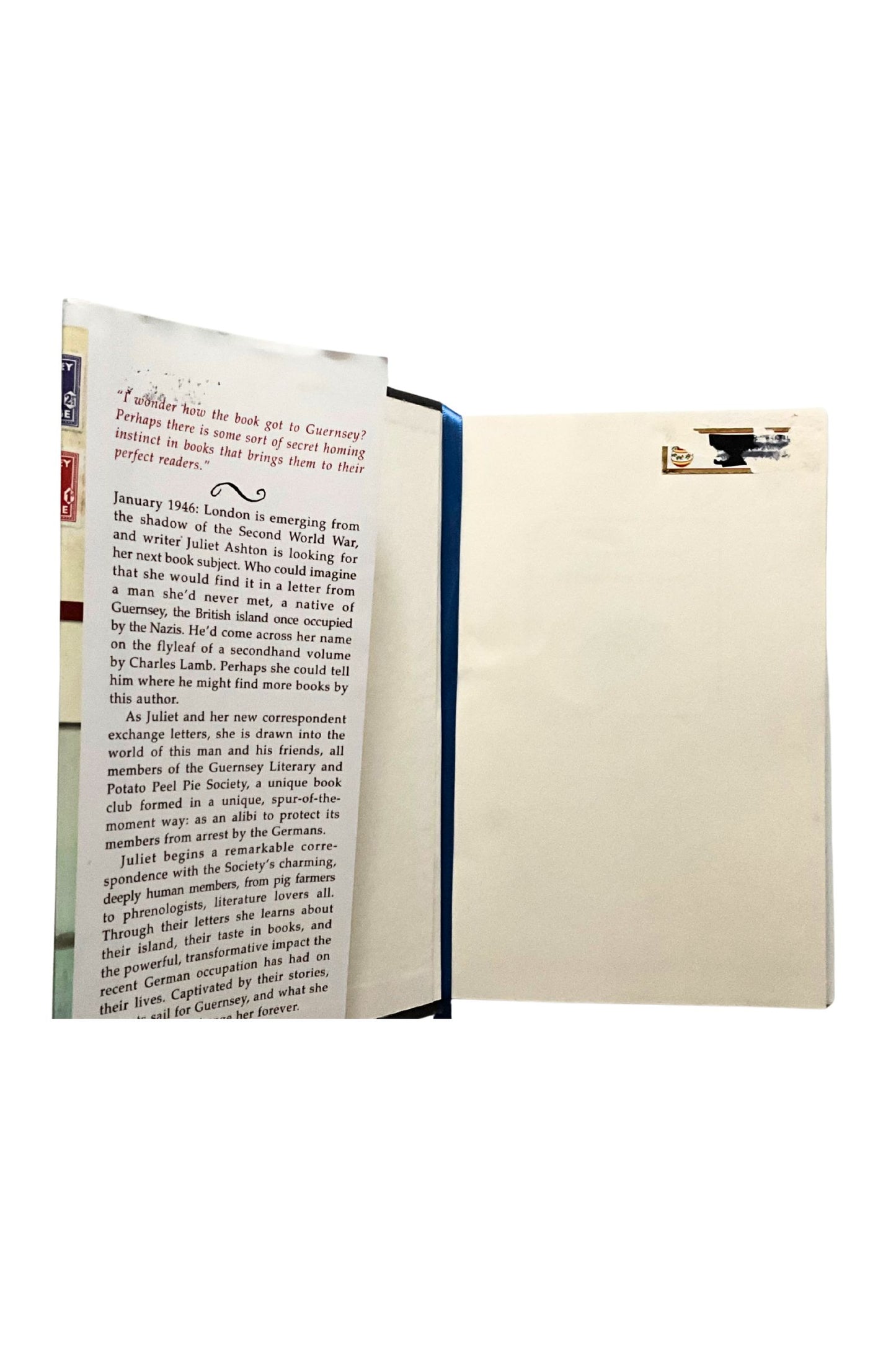 Open book with text on a white background