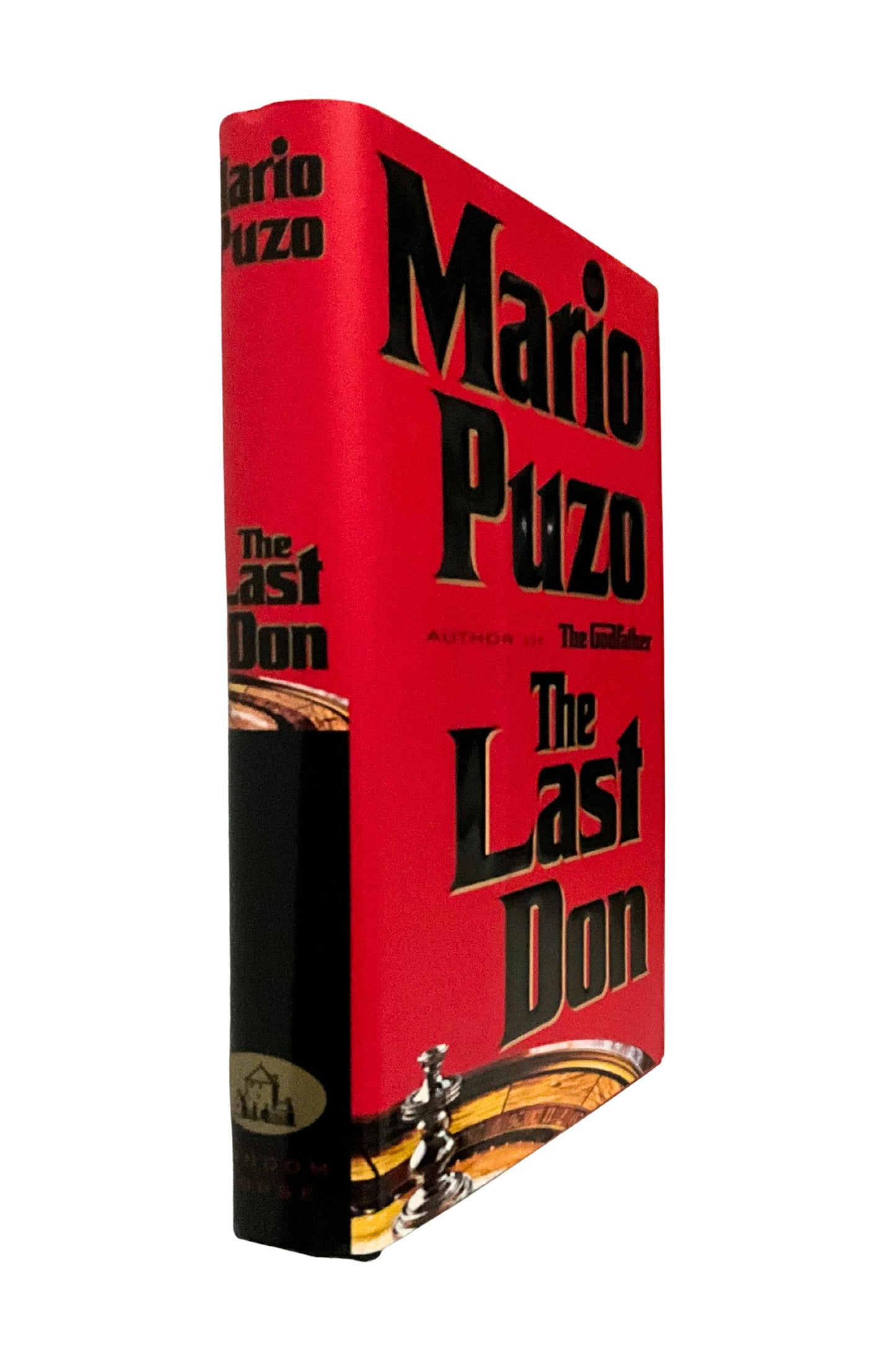 Book titled 'The Last Don' by Mario Puzo with a red cover on a white background