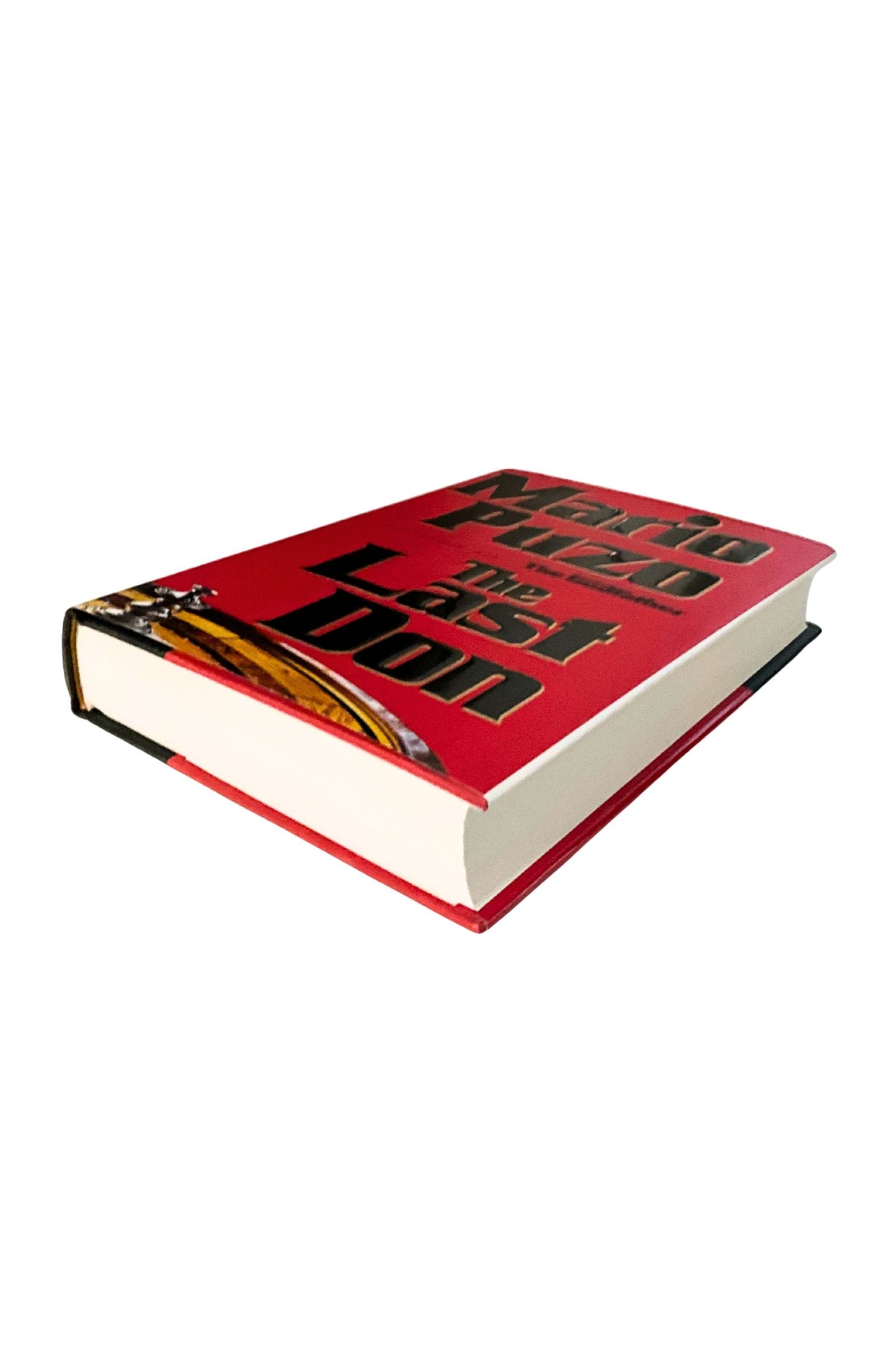 Book titled 'The Last Don’' by Mario Puzo on a white background