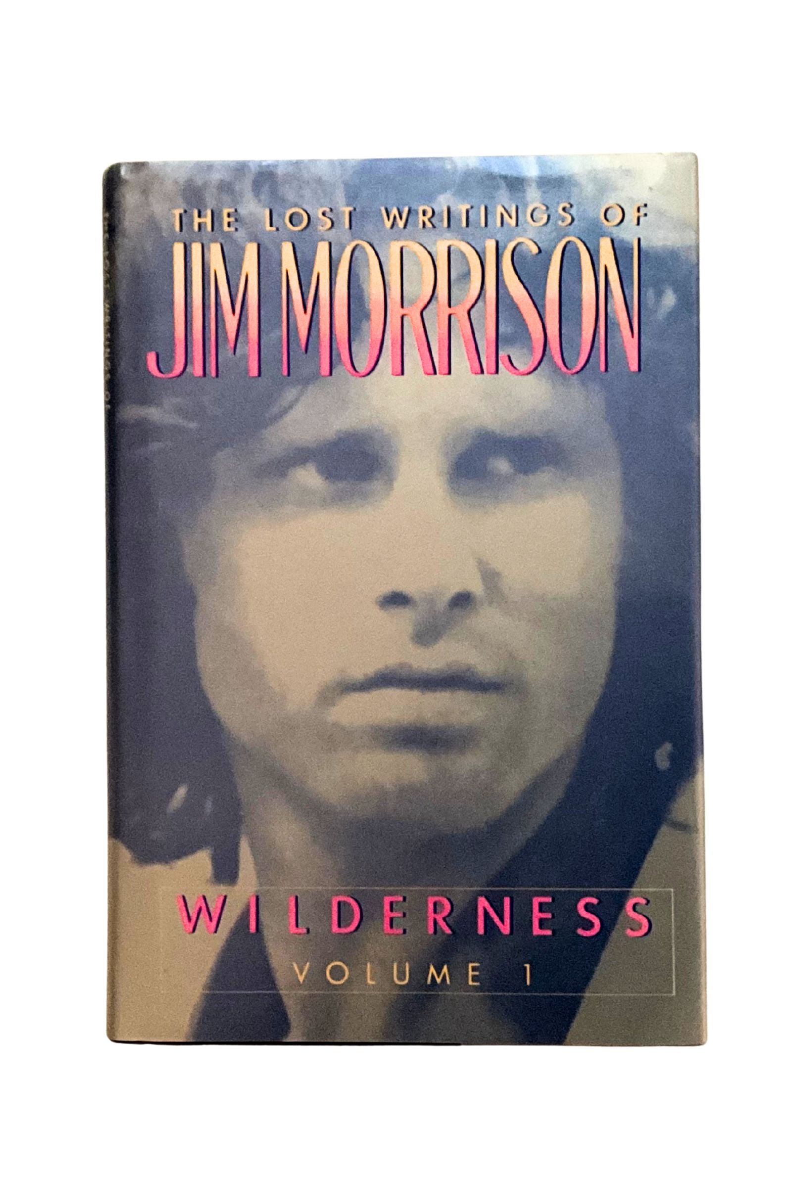 Book cover of 'The Lost Writings of Jim Morrison: Wilderness Volume 1' with a portrait of Jim Morrison.
