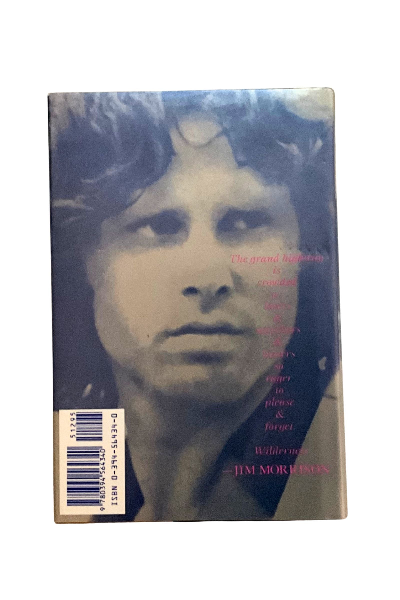 Back cover with a portrait of Jim Morrison  and text on a white background
