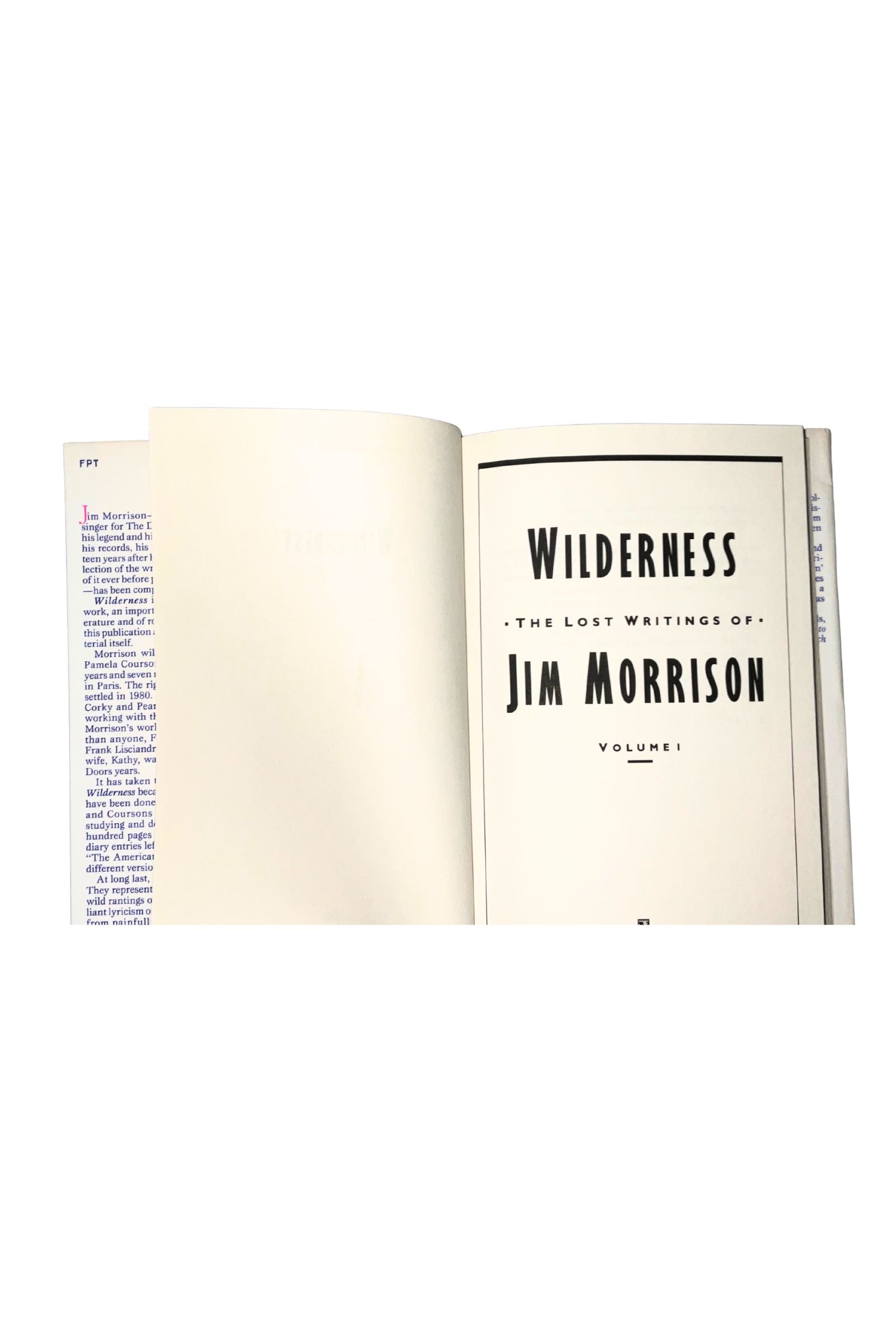 Open book titled 'Wilderness: The Lost Writings of Jim Morrison' on a white background