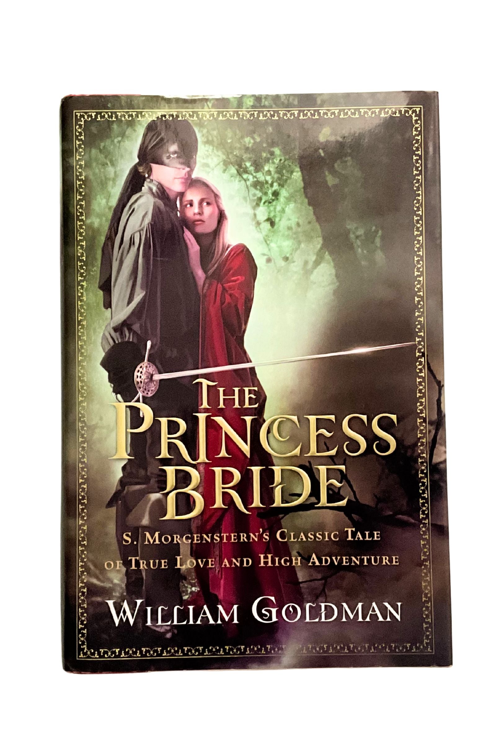 Book cover of 'The Princess Bride' by William Goldman with Princess Buttercup and Westley in a forest setting.