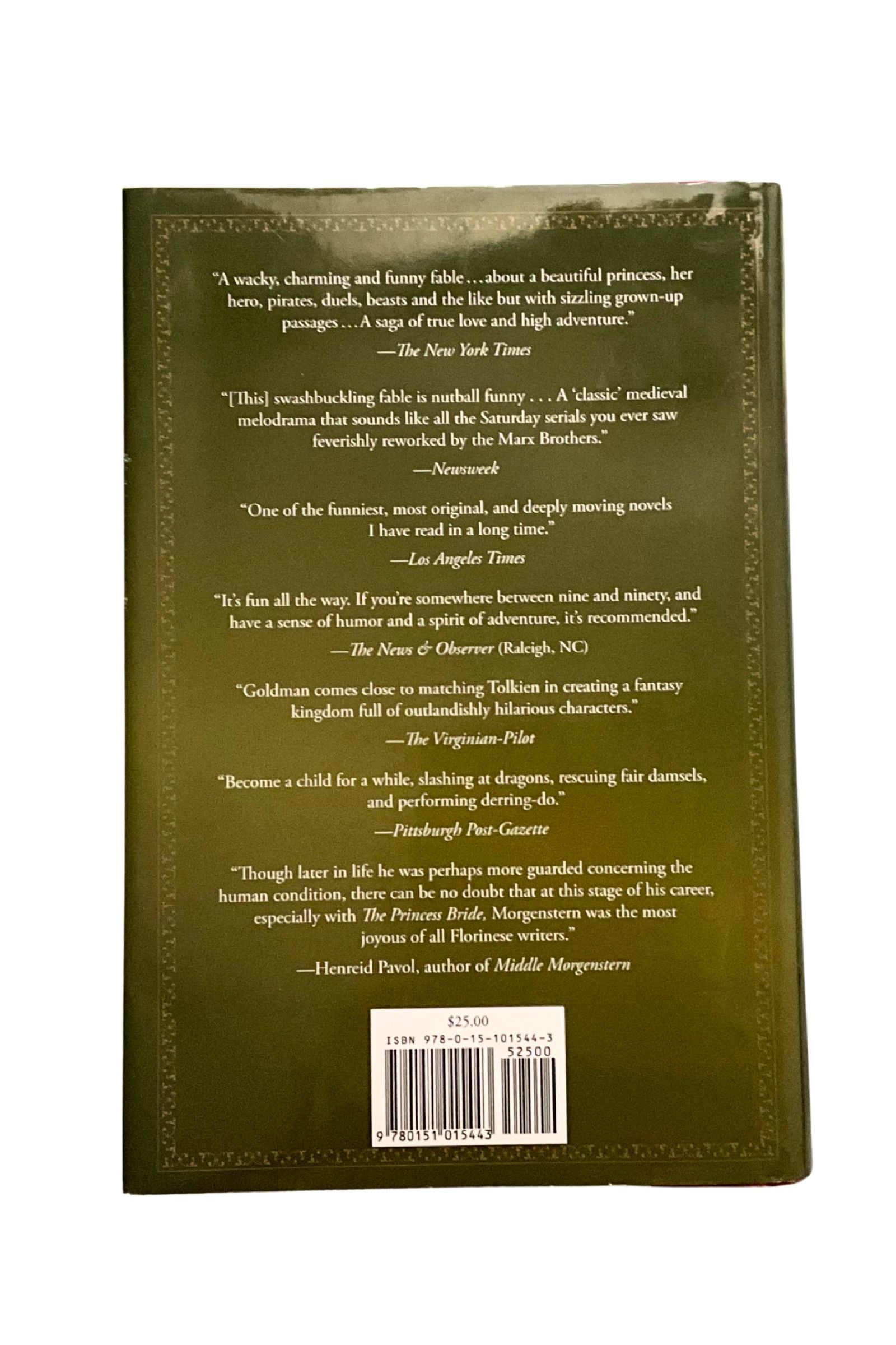 Back cover of a book with text and a barcode on a white background