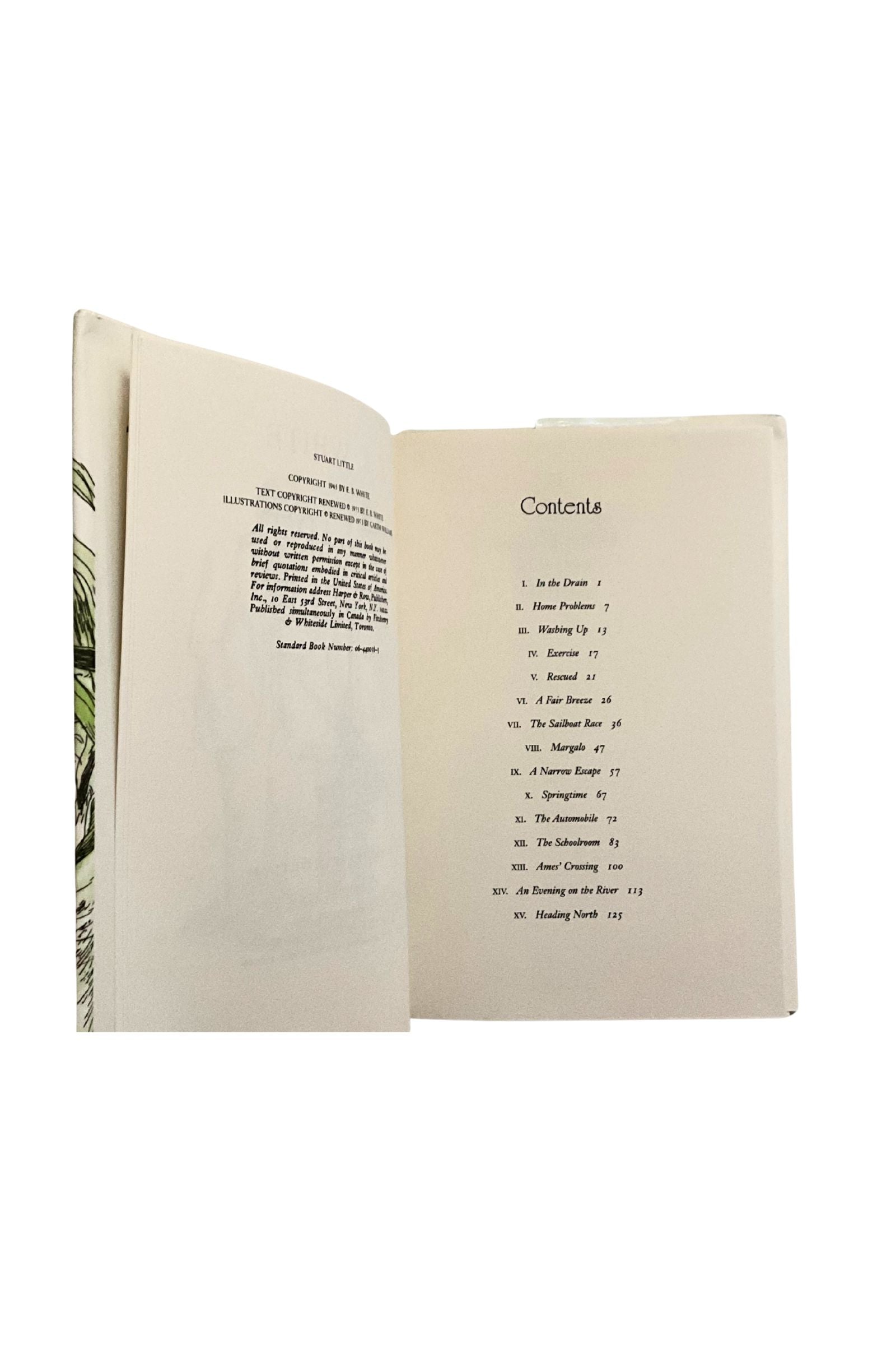 Open book with copyright information and  a table of contents on a white background