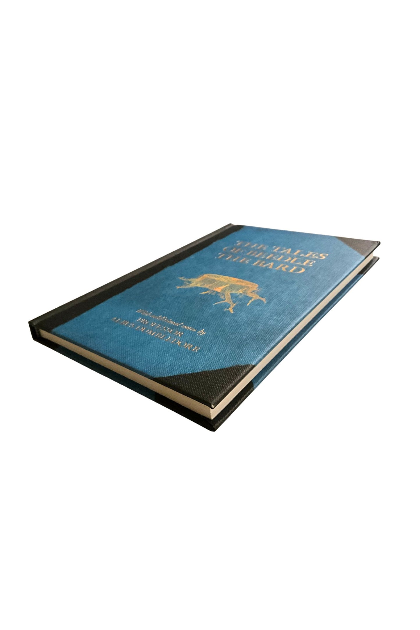Blue book with gold text and design on a white background