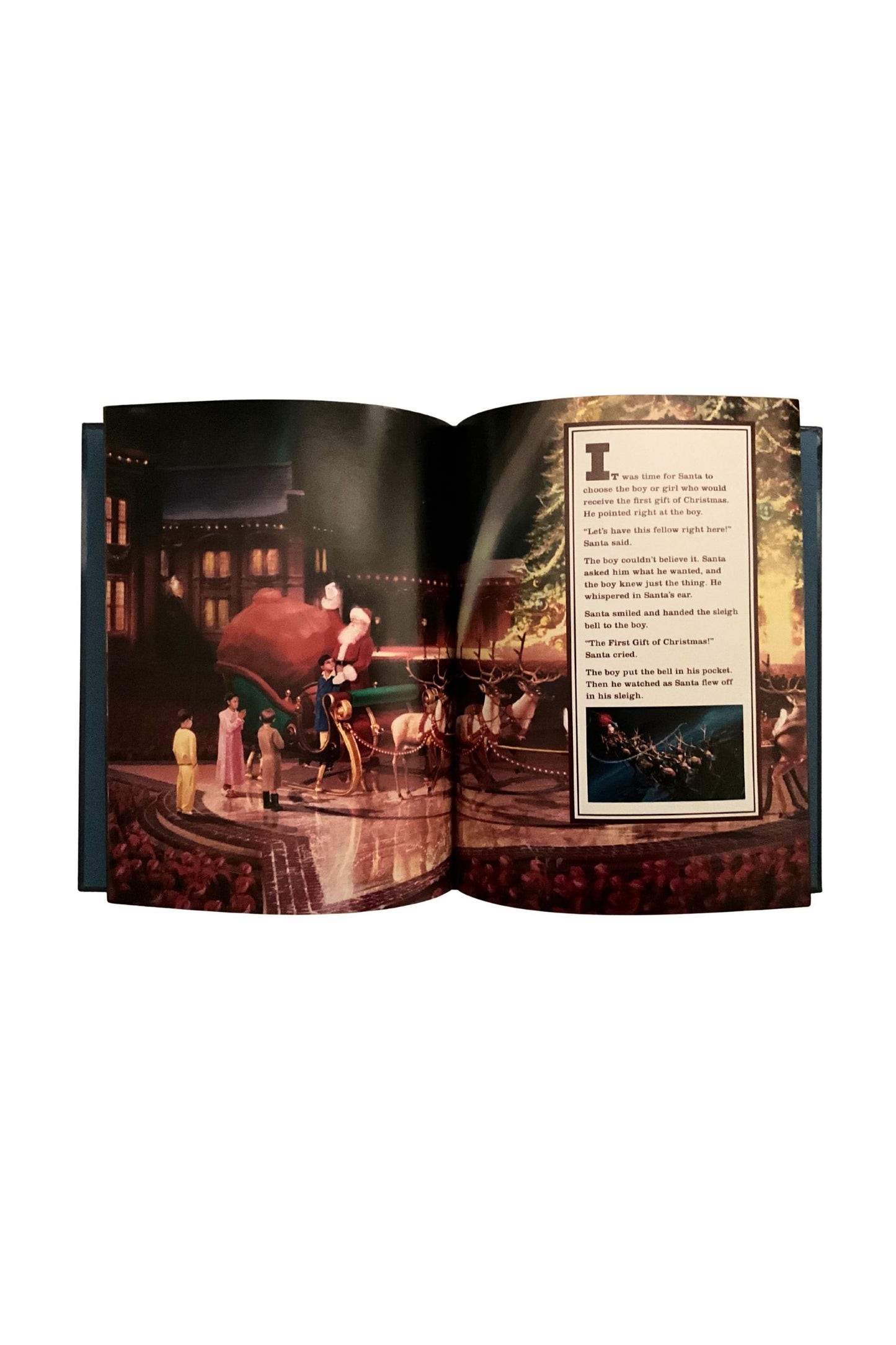 Open book with a  Christmas scene  and text on a white background