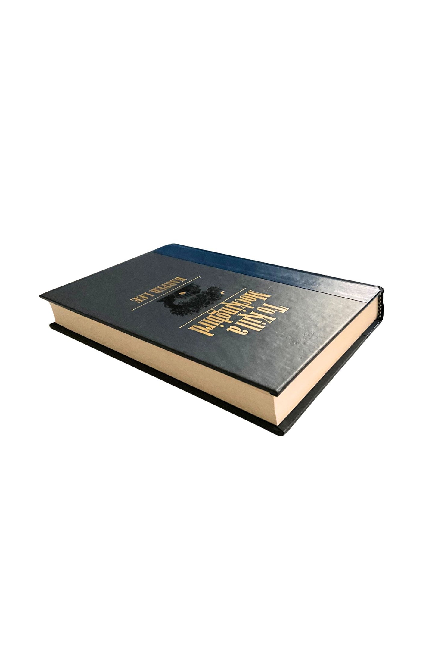 Dark blue book with gold text on a white background