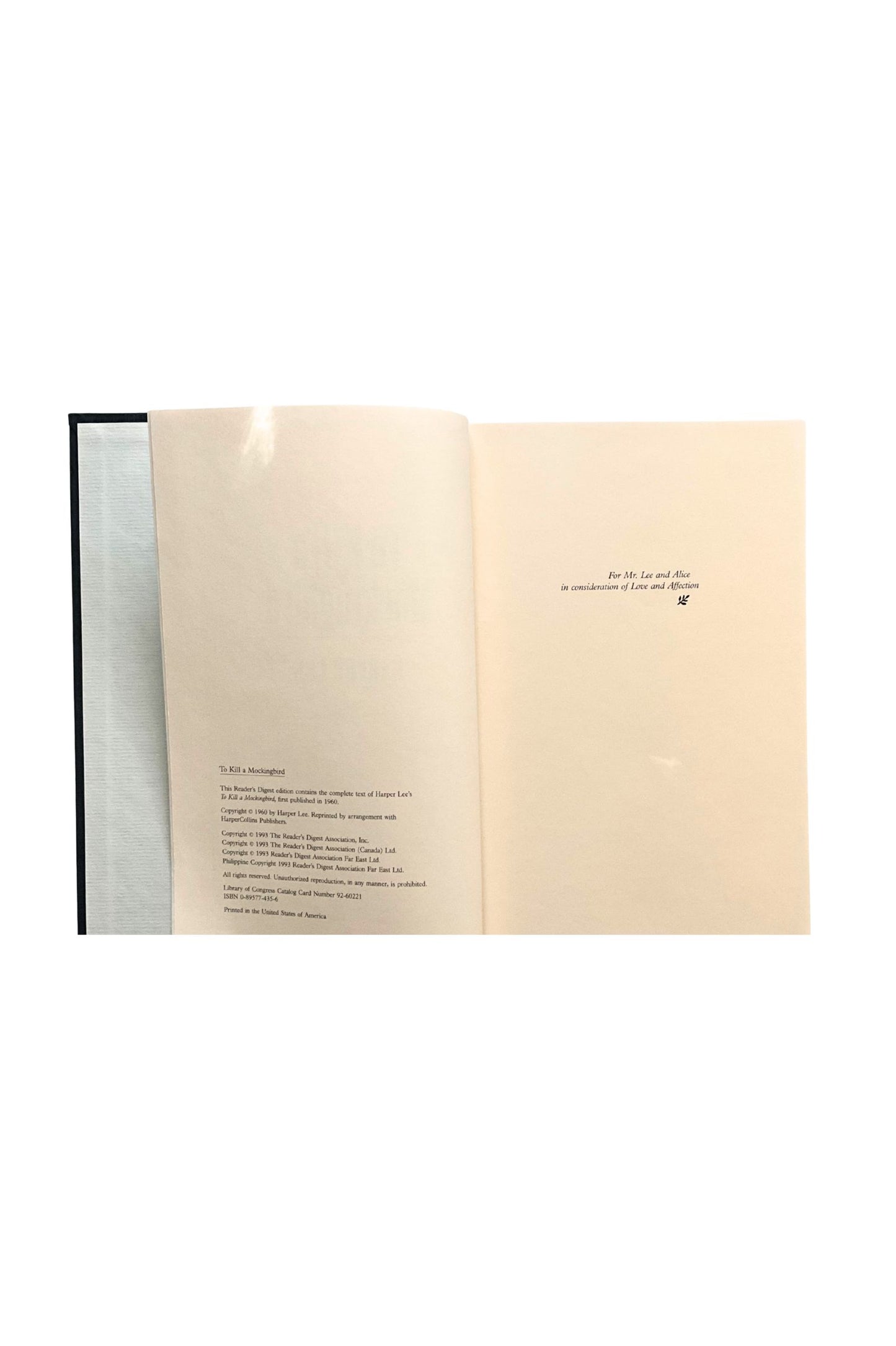 Open book showing copyright information, set on a white background