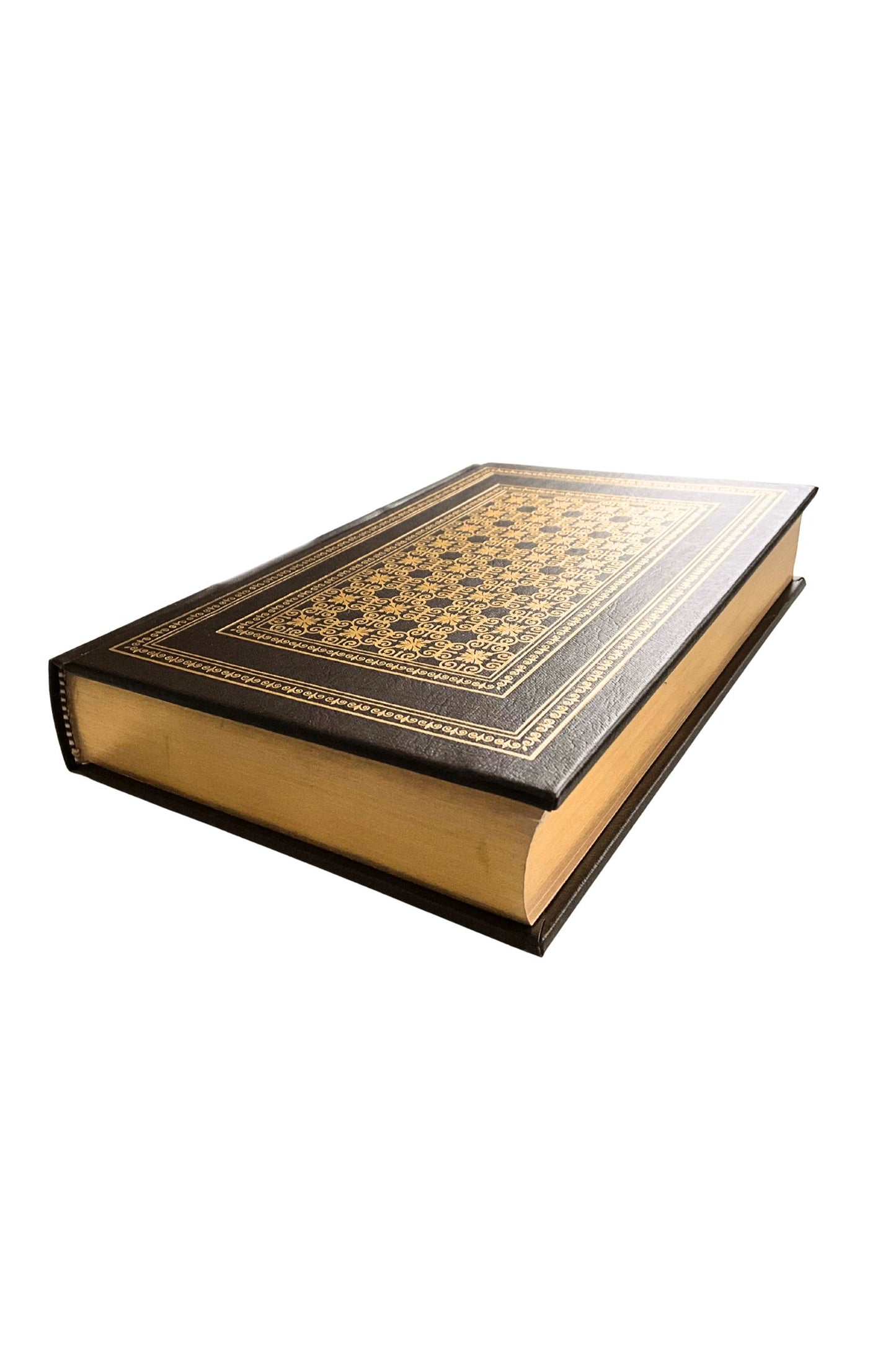 Decorative book with ornate cover on a white background