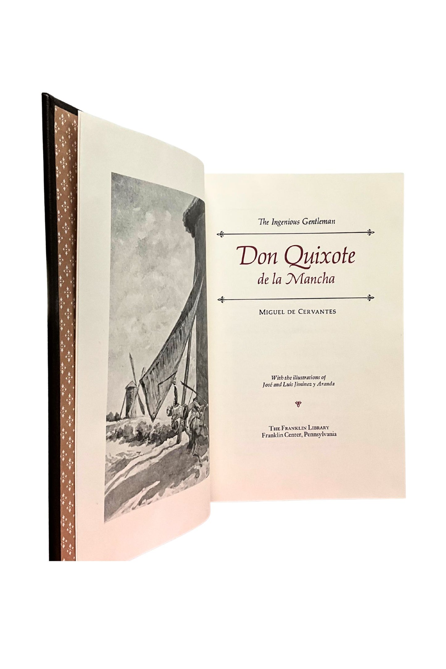 Open book of 'Don Quixote de la Mancha' with illustrations on a white background