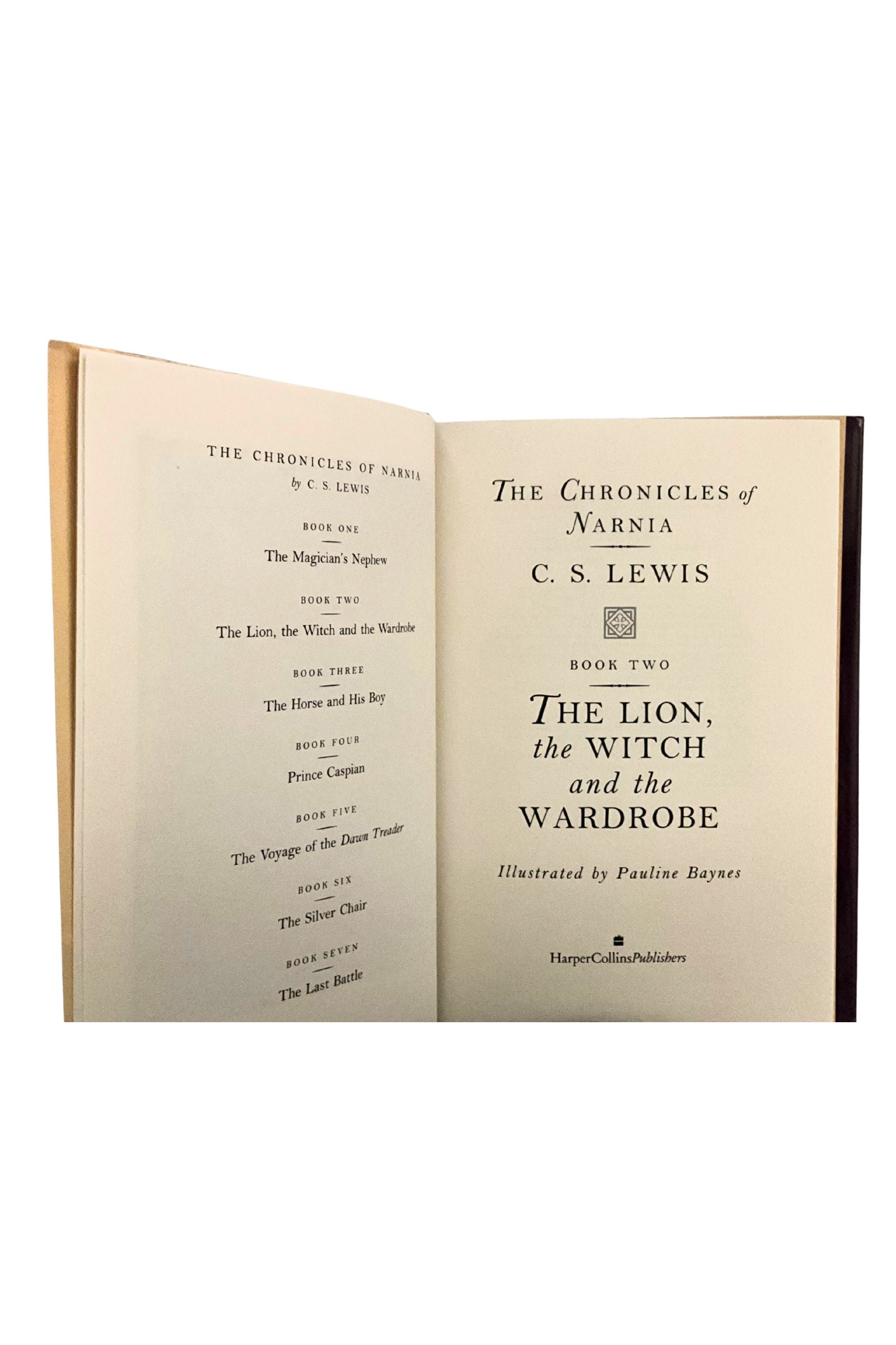 Open book titled 'The Chronicles of Narnia' by C.S. Lewis on a white background