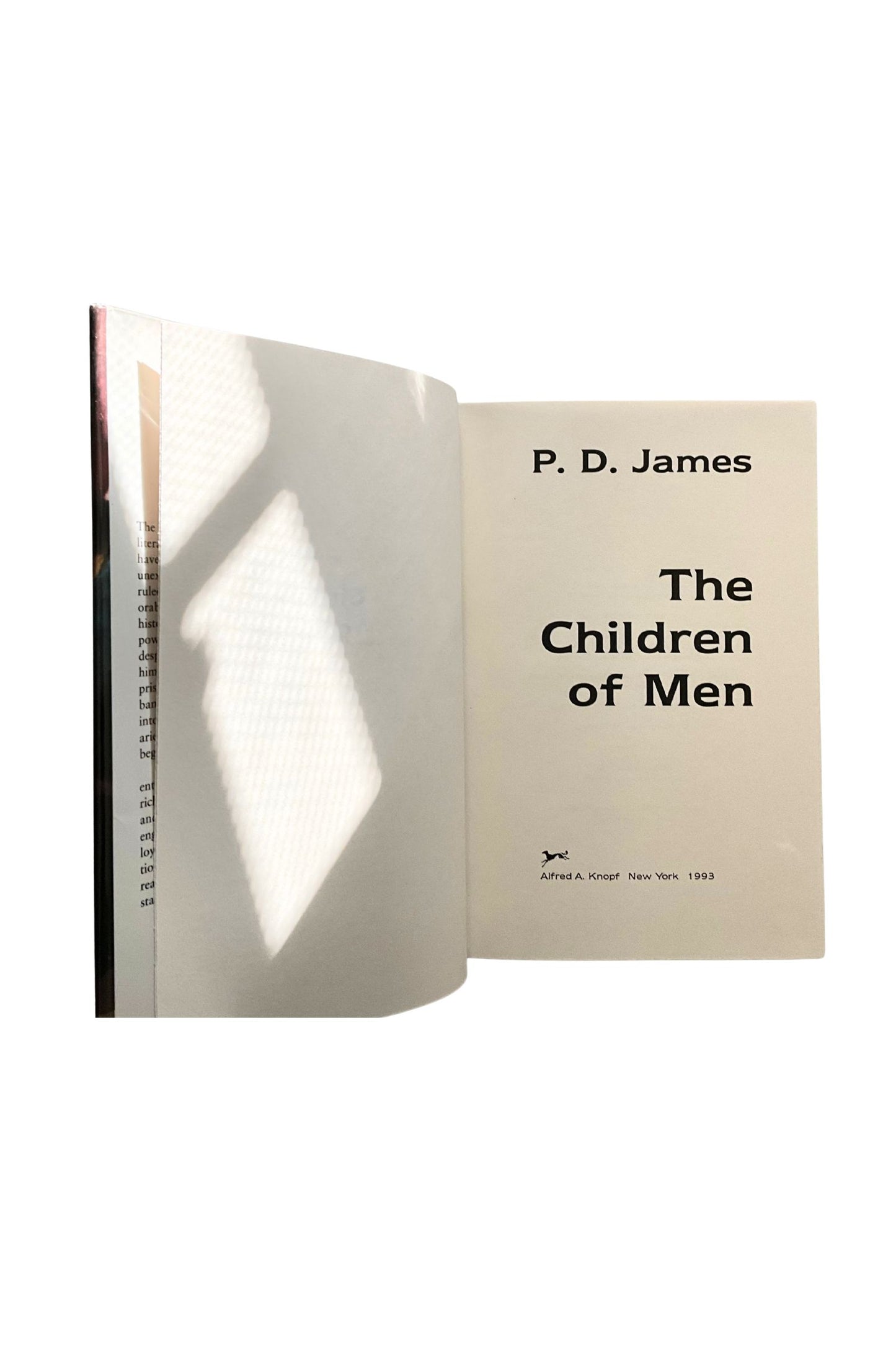 Open book showing the title 'The Children of Men' by P. D. James on a white background
