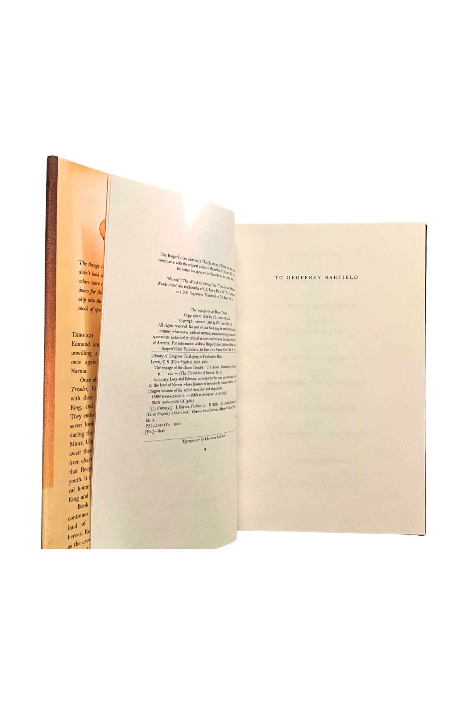 Open book with visible text on a white background